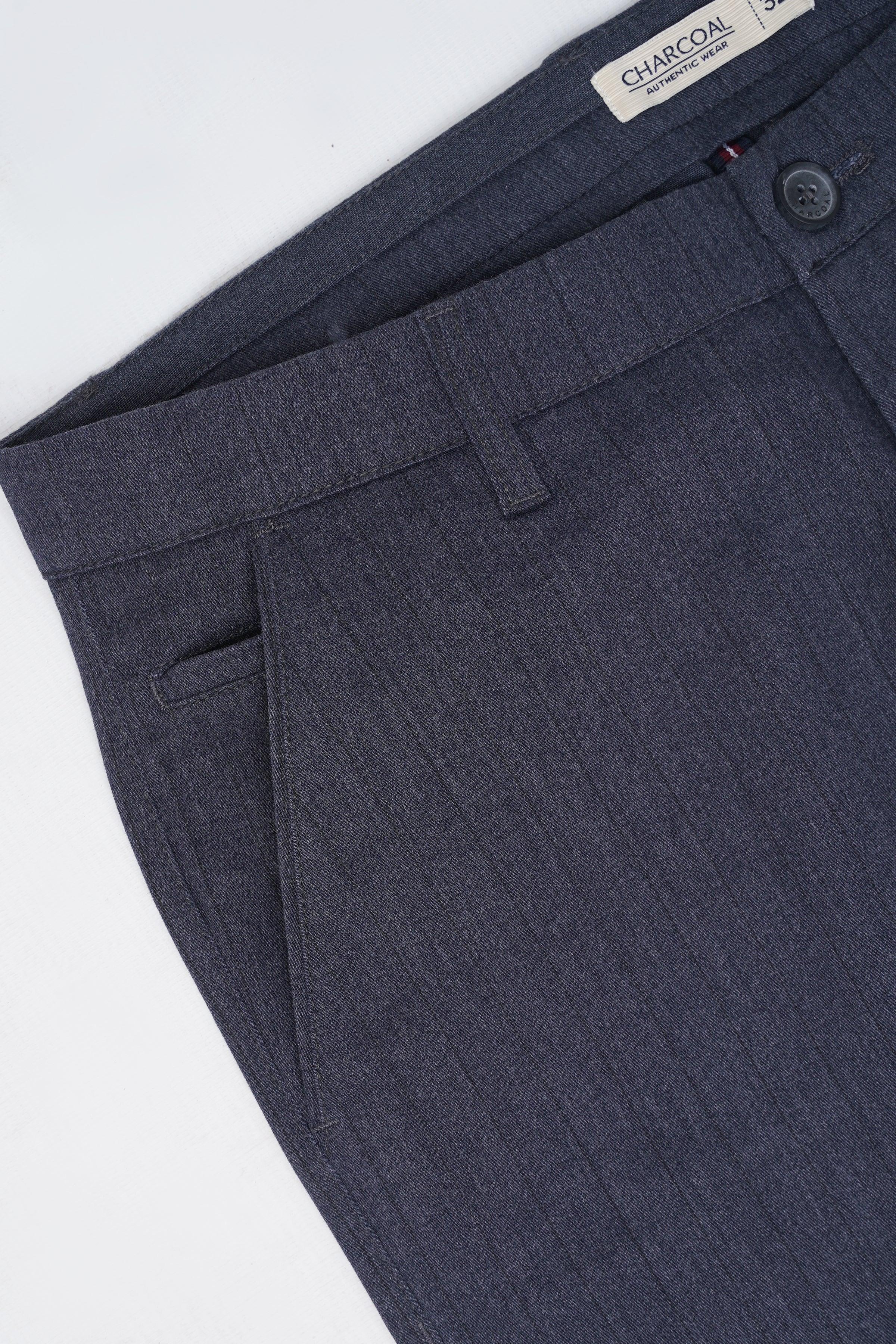 Charcoal casual pants close-up showing waistband, belt loops, and front pocket