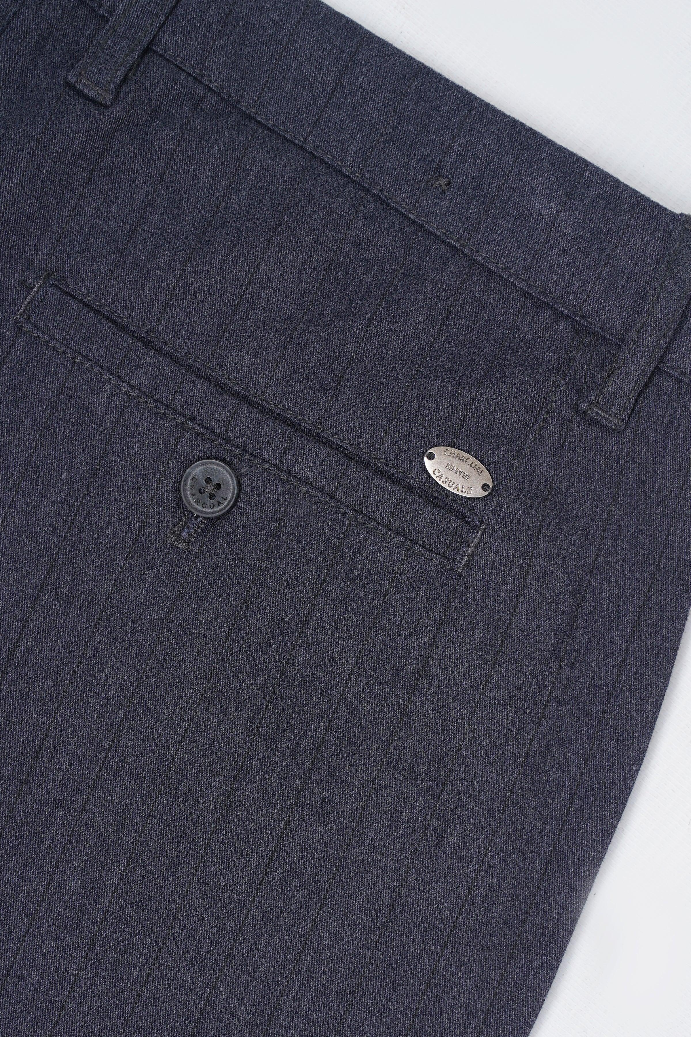 Charcoal casual pants close-up of front buttons and pocket stitching