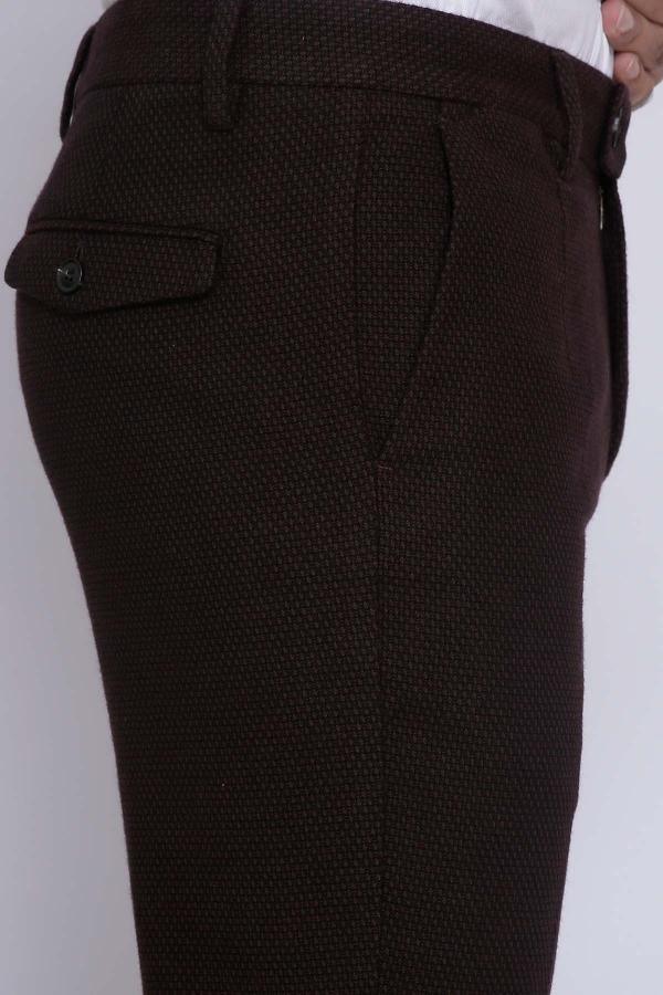 Dark brown casual pants close-up of back pocket and textured fabric