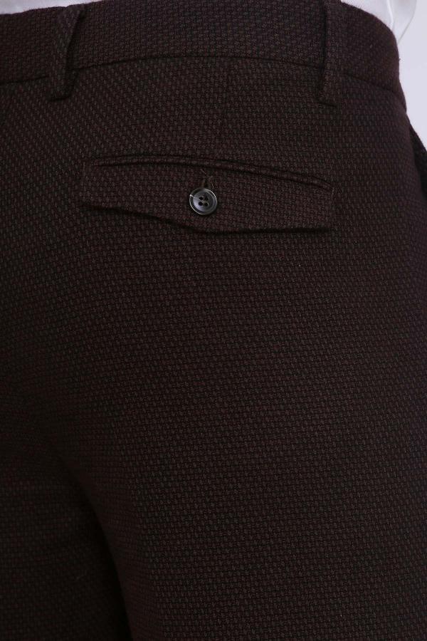 Dark brown casual pants close-up of back waistband tab and single button