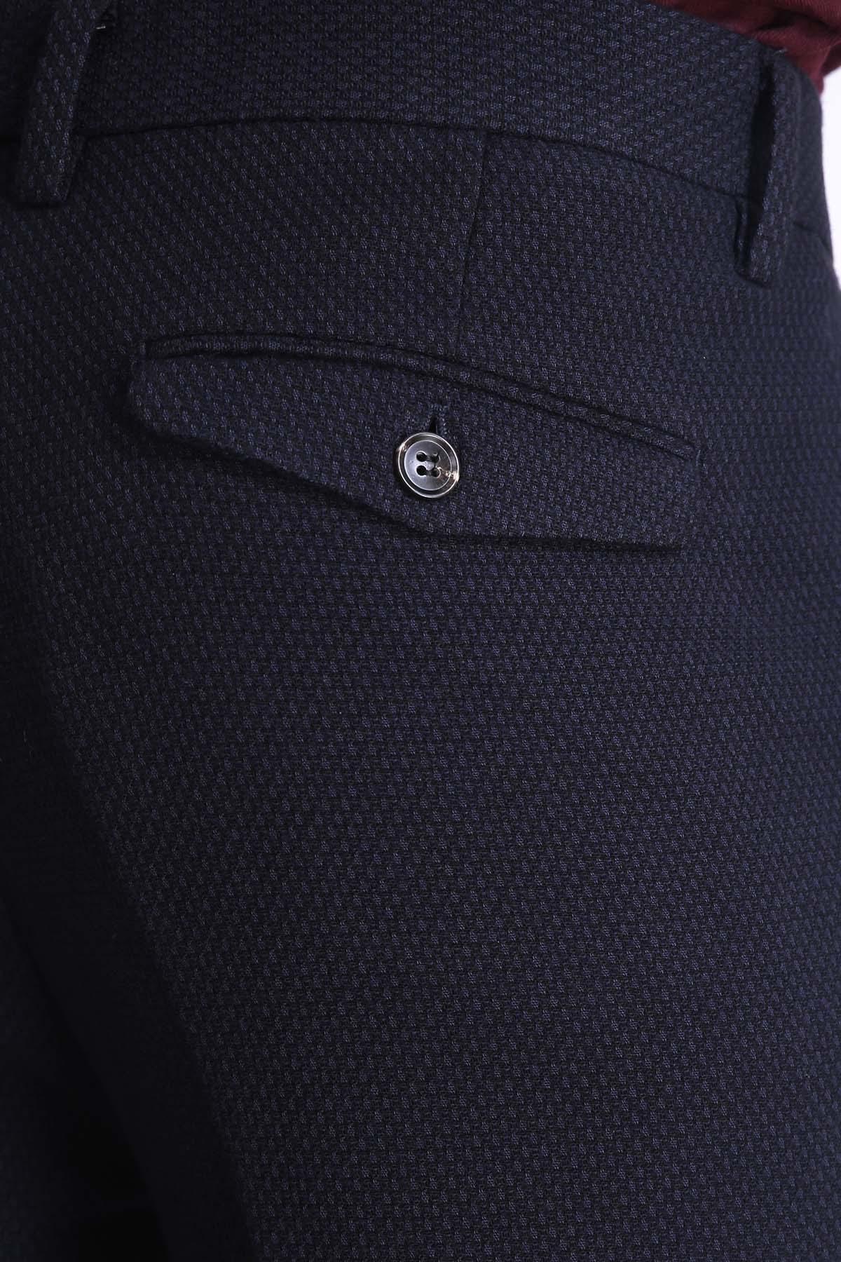 Navy trouser front coin pocket with round metal button