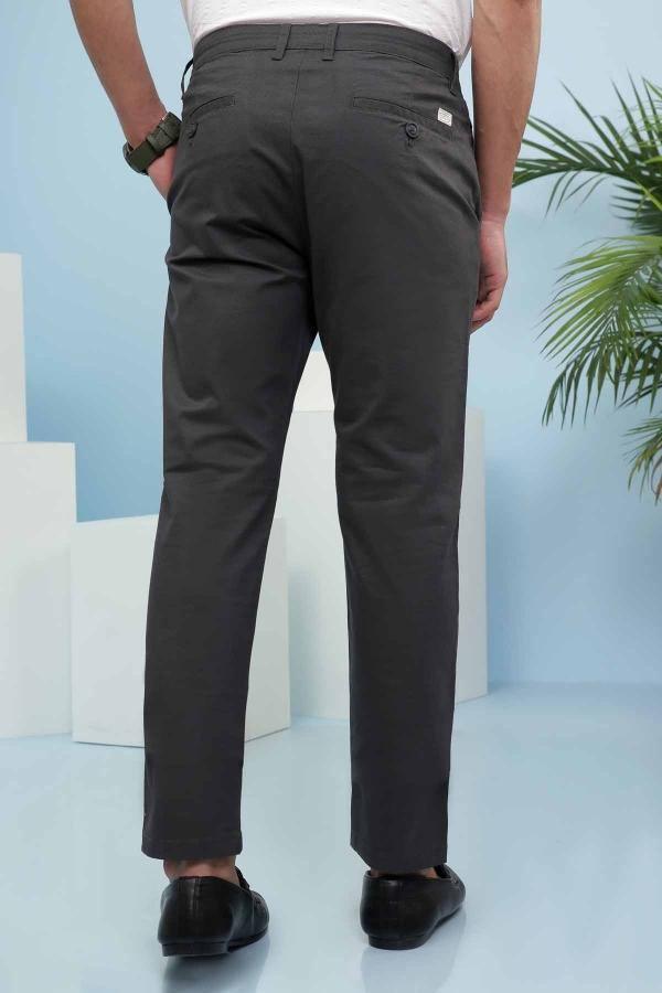 Slim-fit dark grey casual trousers with front pockets and cuffed hem