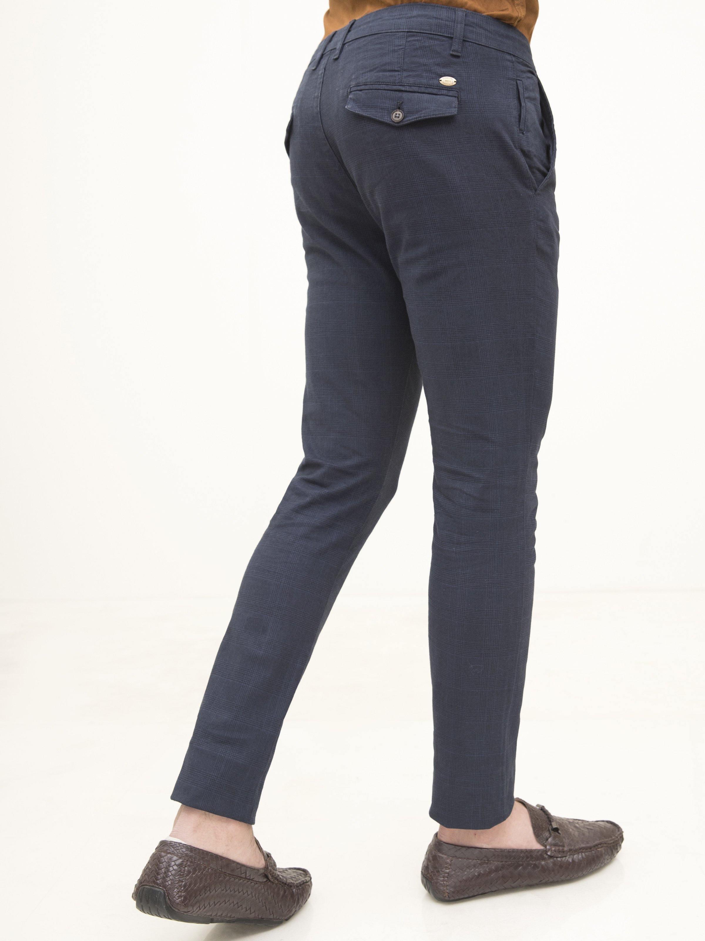 Navy casual pants with button-back welt pocket and cross pocket flap