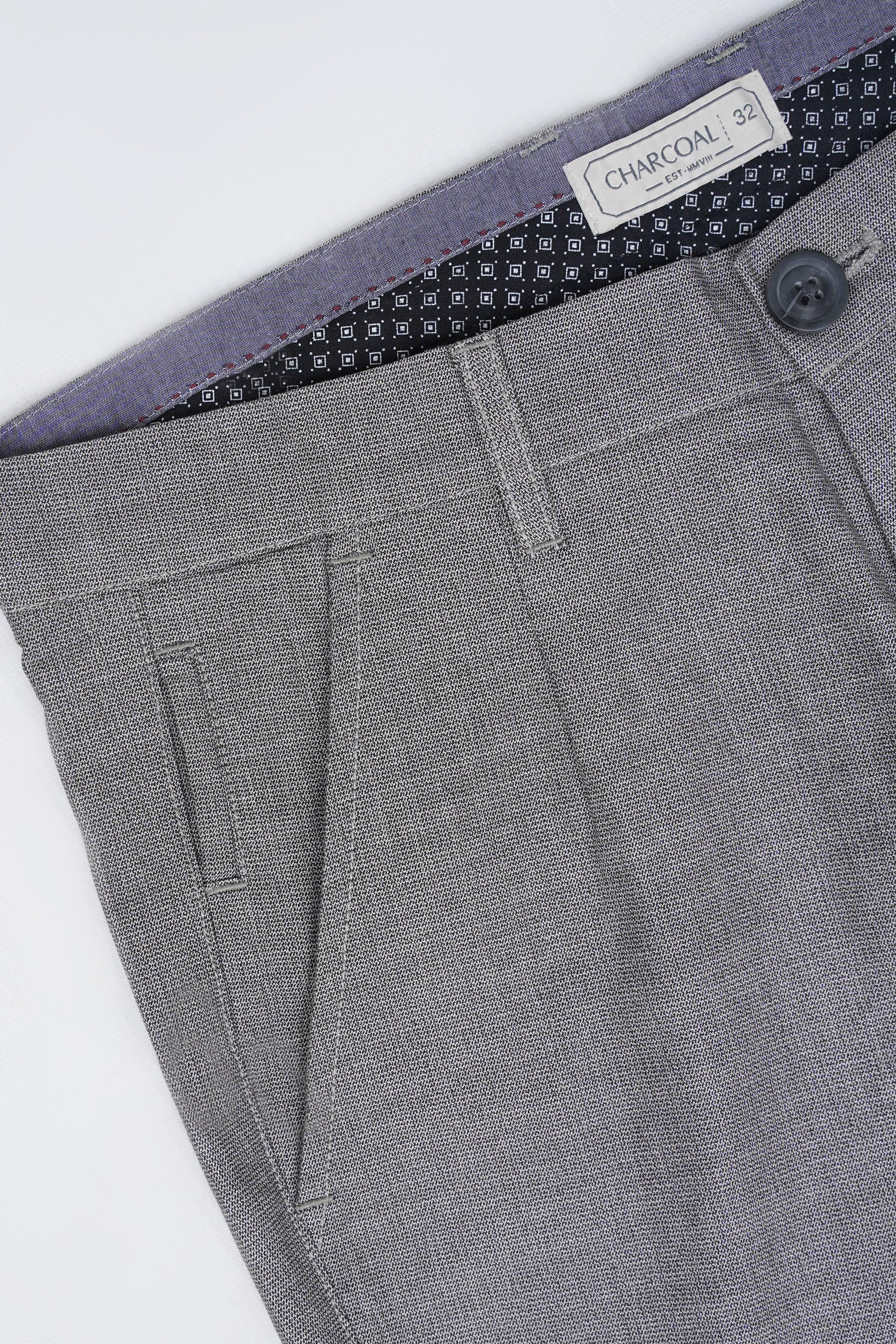 Grey casual trousers waistband with logo label, button closure, and belt loops