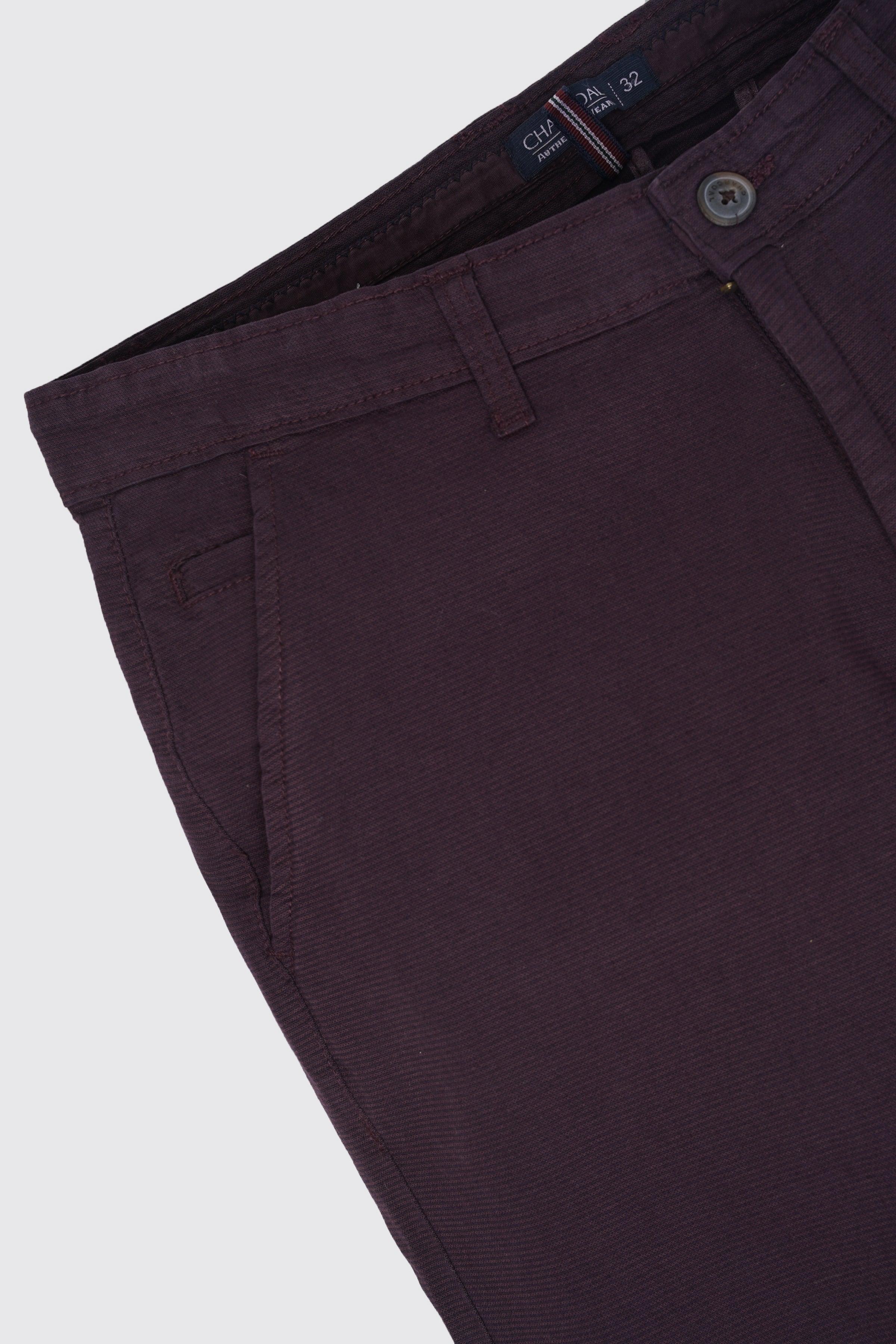 Maroon casual pants with belt loops and buttoned waistband, front close-up
