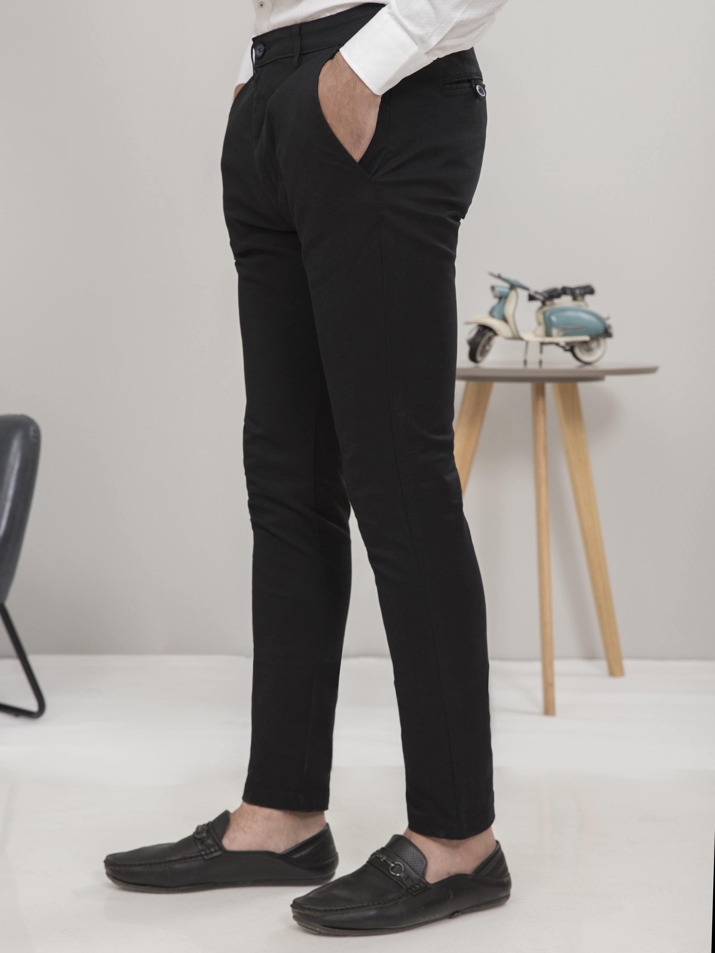 Black slim-fit casual pants with zipper fly and belt loops