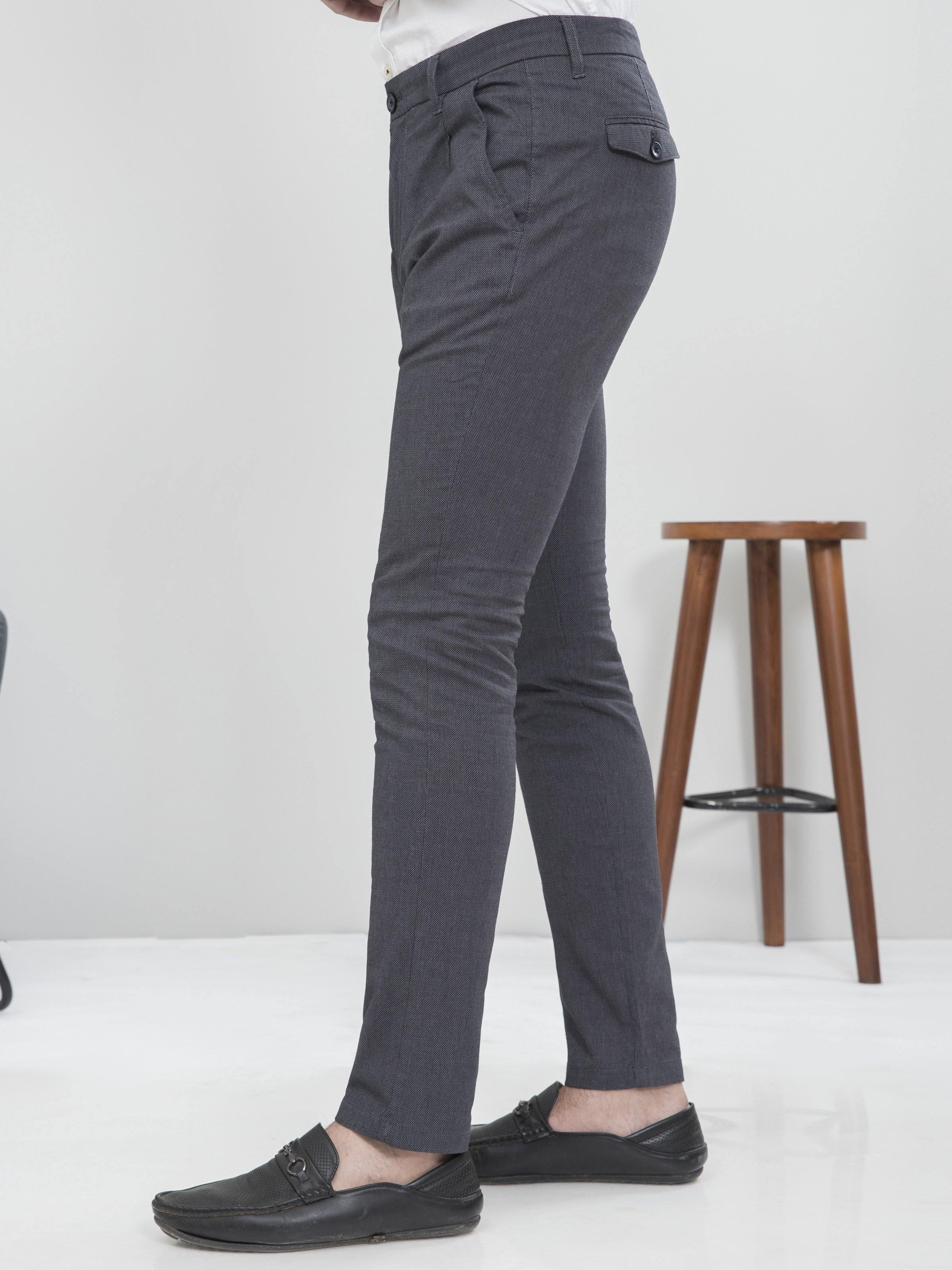 Blue-black slim fit casual pants, side view with front pockets and belt loops