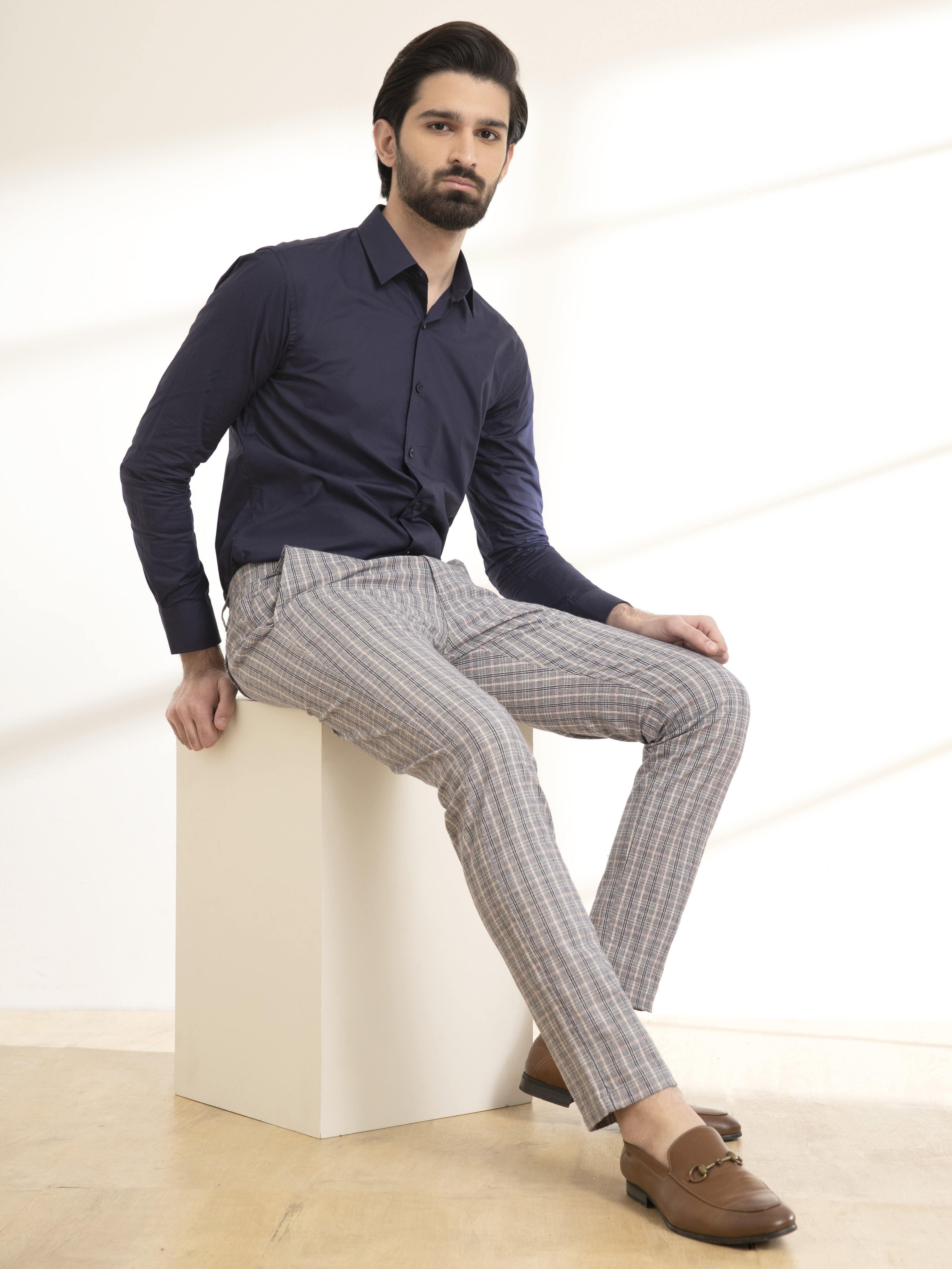 Slim-fit plaid trousers with cuffed hem and side pockets