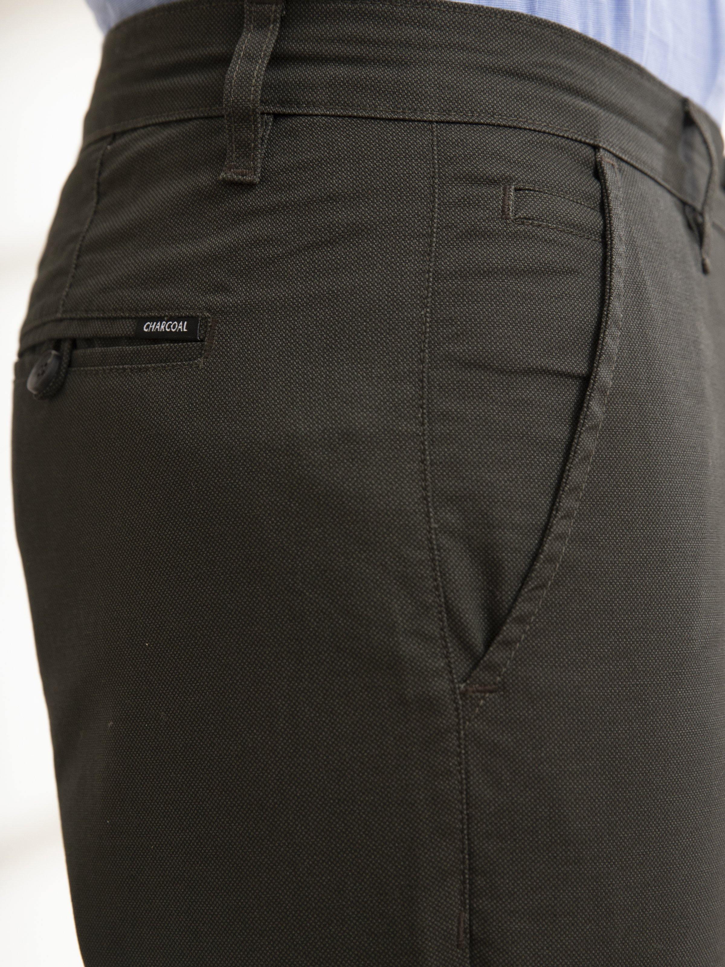 Olive back pants pocket with seam detail and belt loop