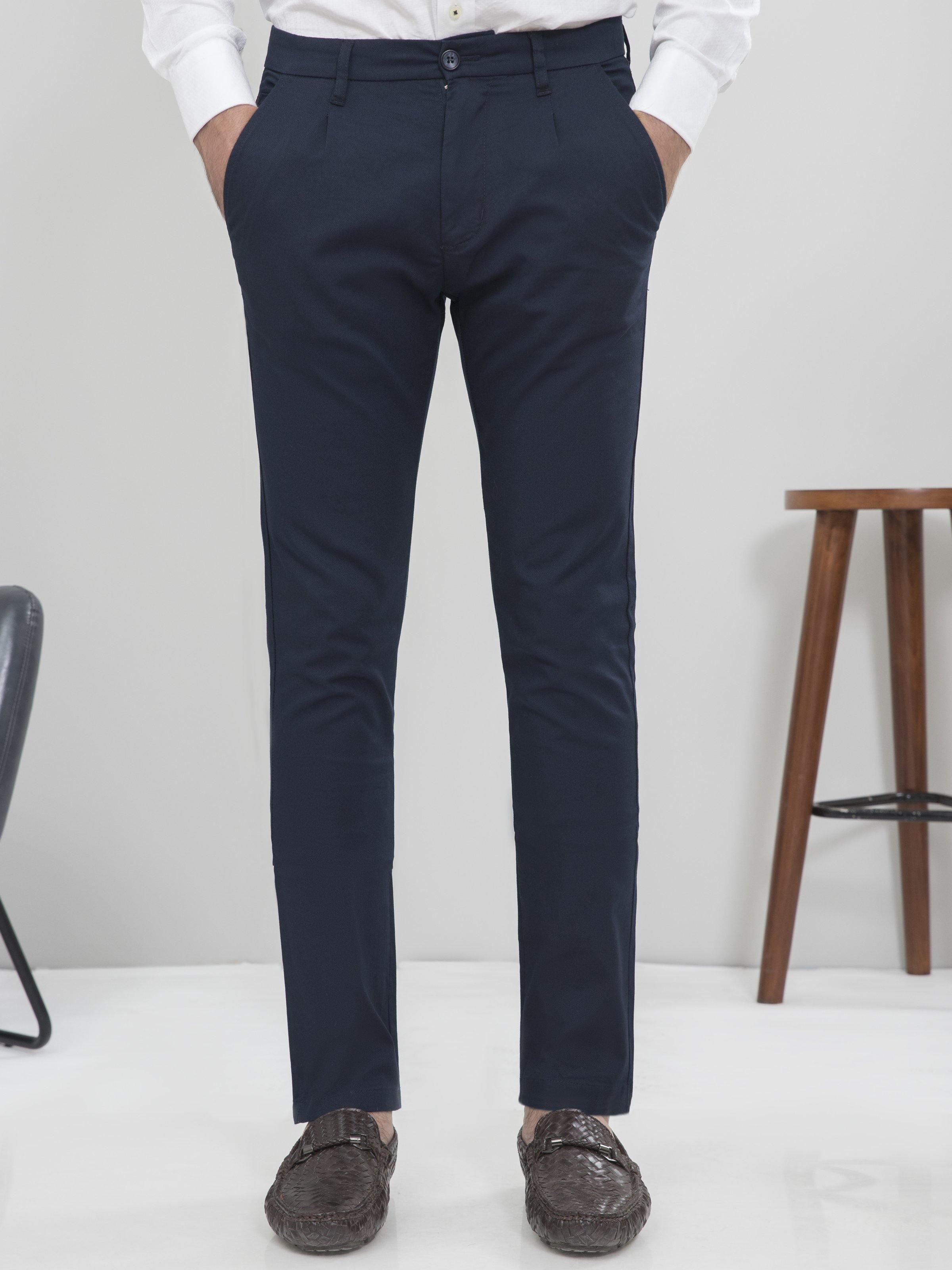 Navy slim-fit casual pants with belt loops, button fly, and two front pockets