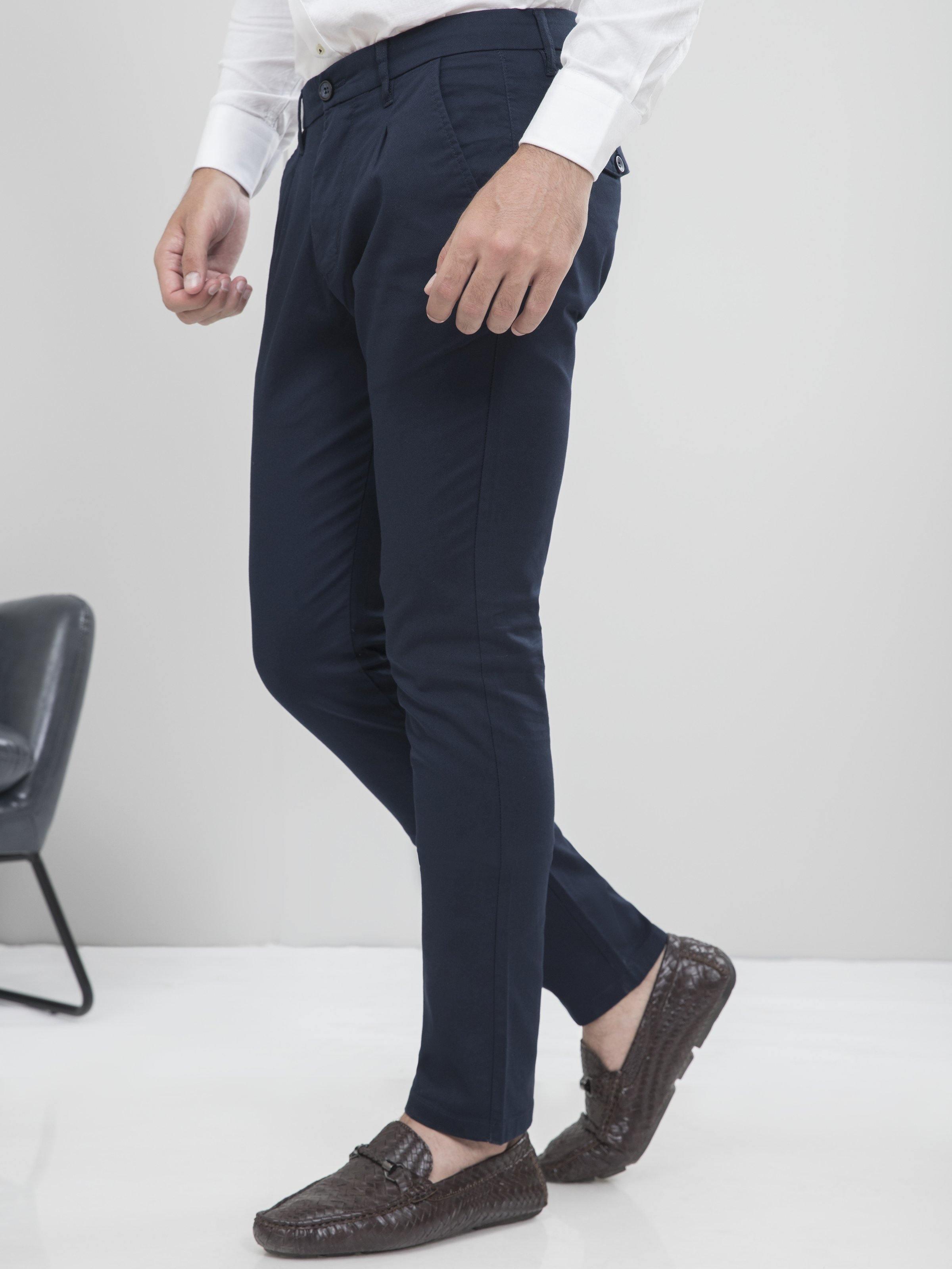 Navy slim-fit casual pants, tapered legs with side pockets and ankle-length cuff