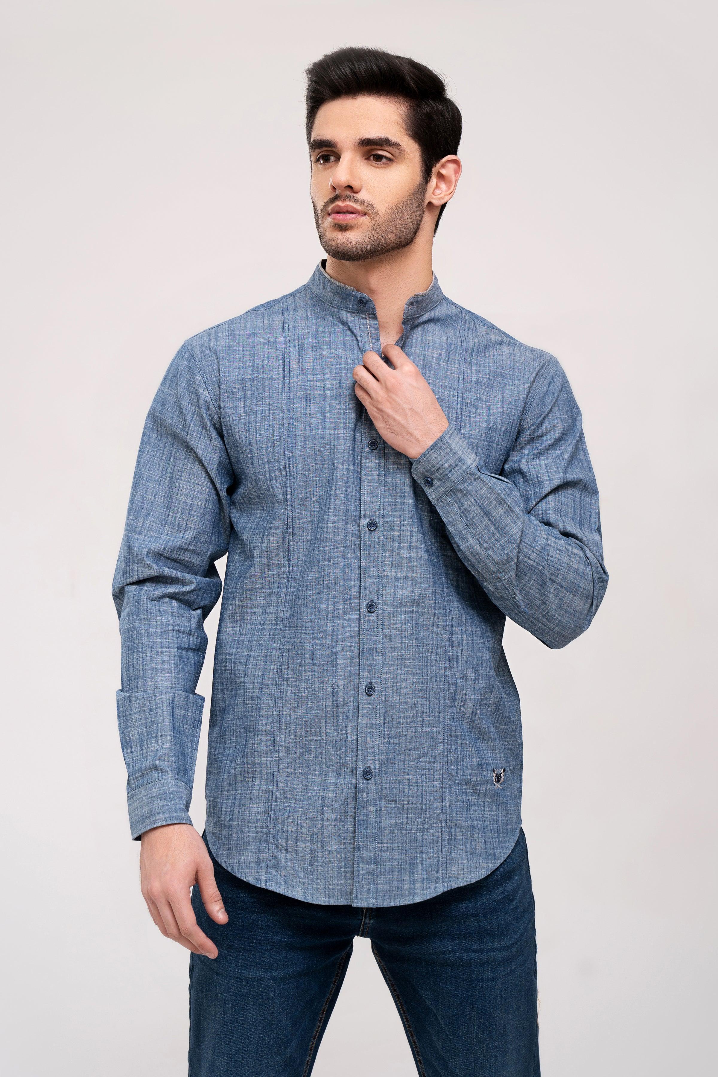Blue casual button-up shirt, long sleeves, button placket; hand near collar