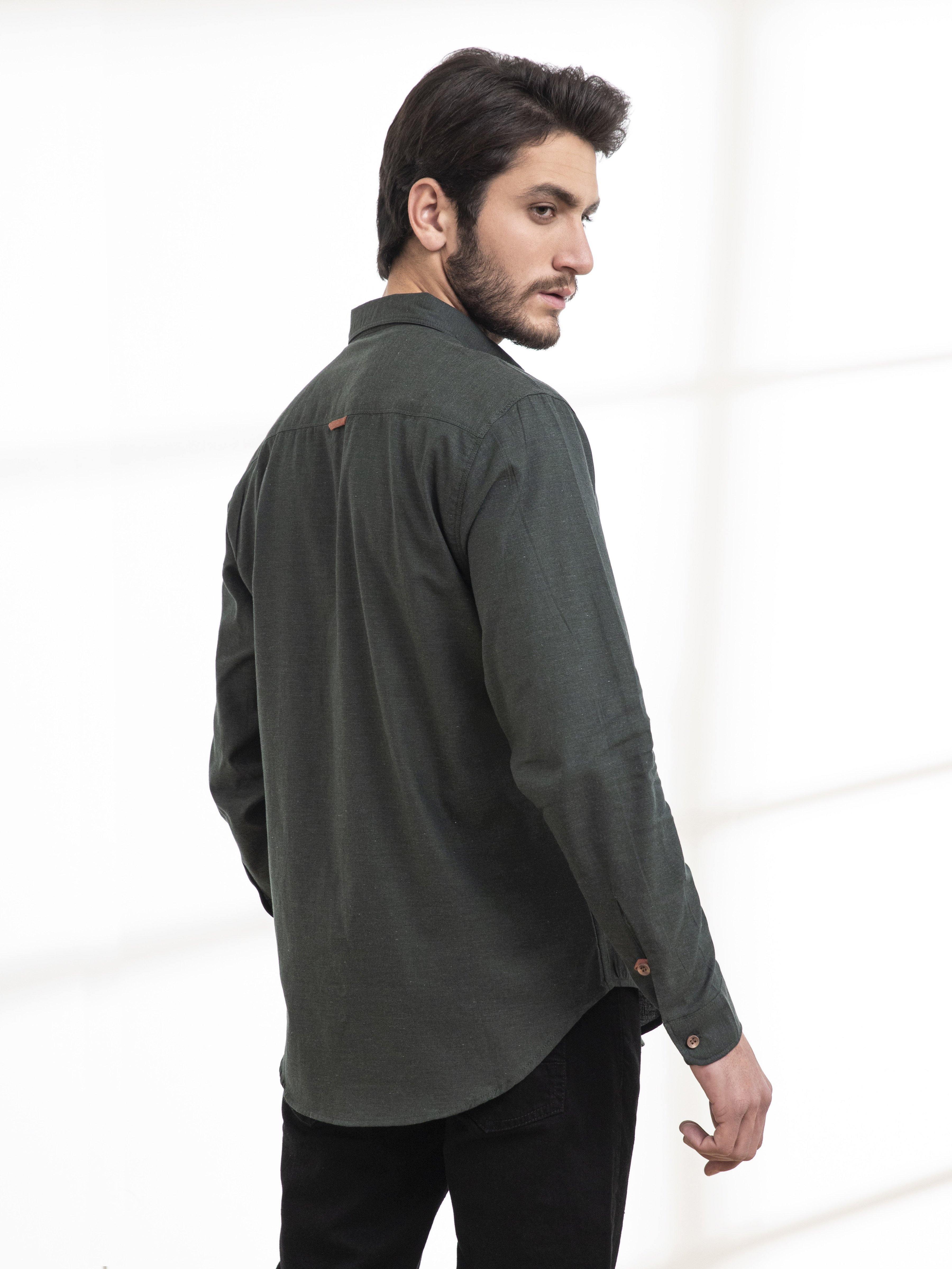 Men's casual dark green full-sleeve button-up shirt, side view with logo