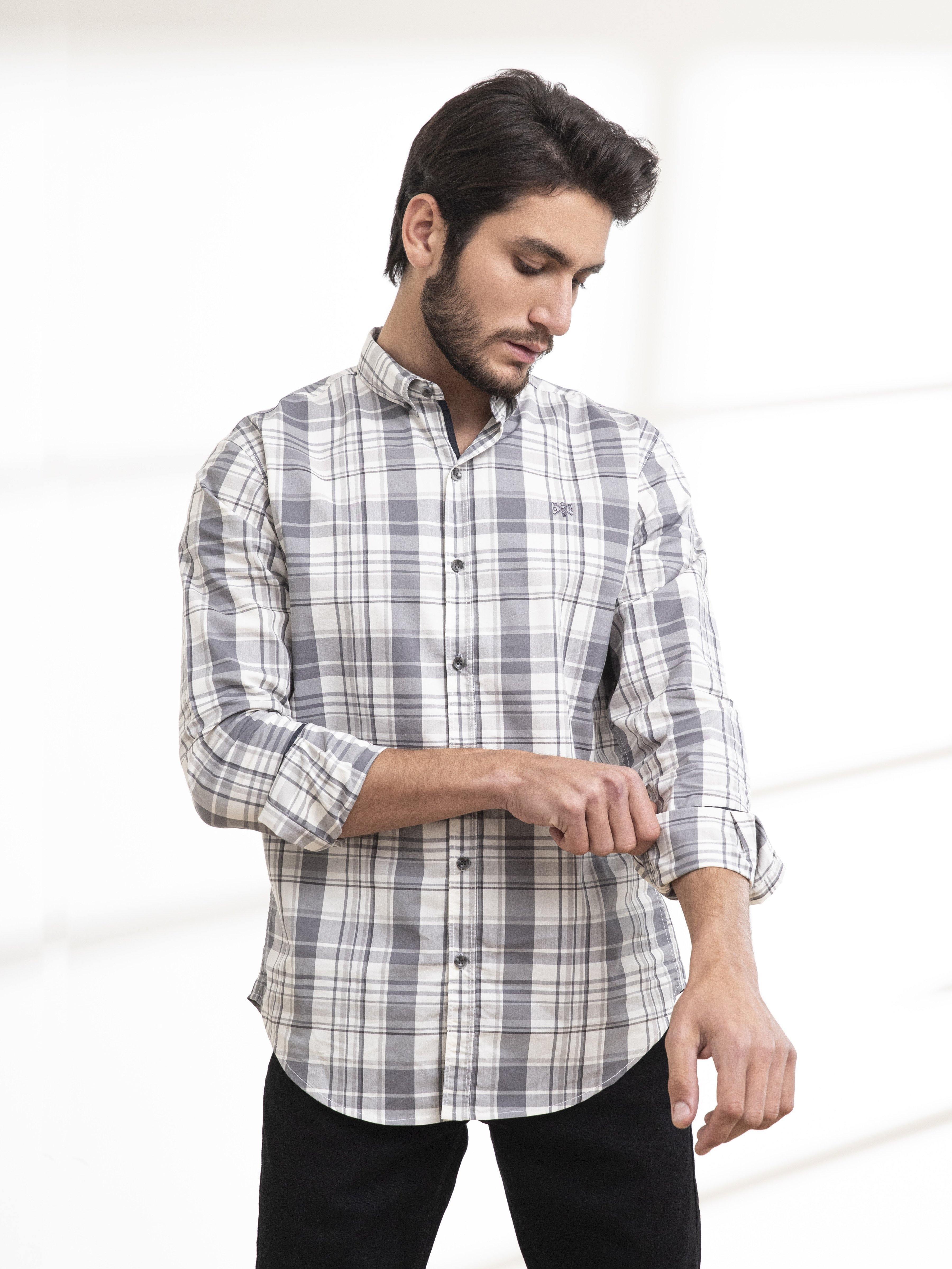 Light grey plaid button-down shirt with long sleeves, sleeves buttoned at cuffs