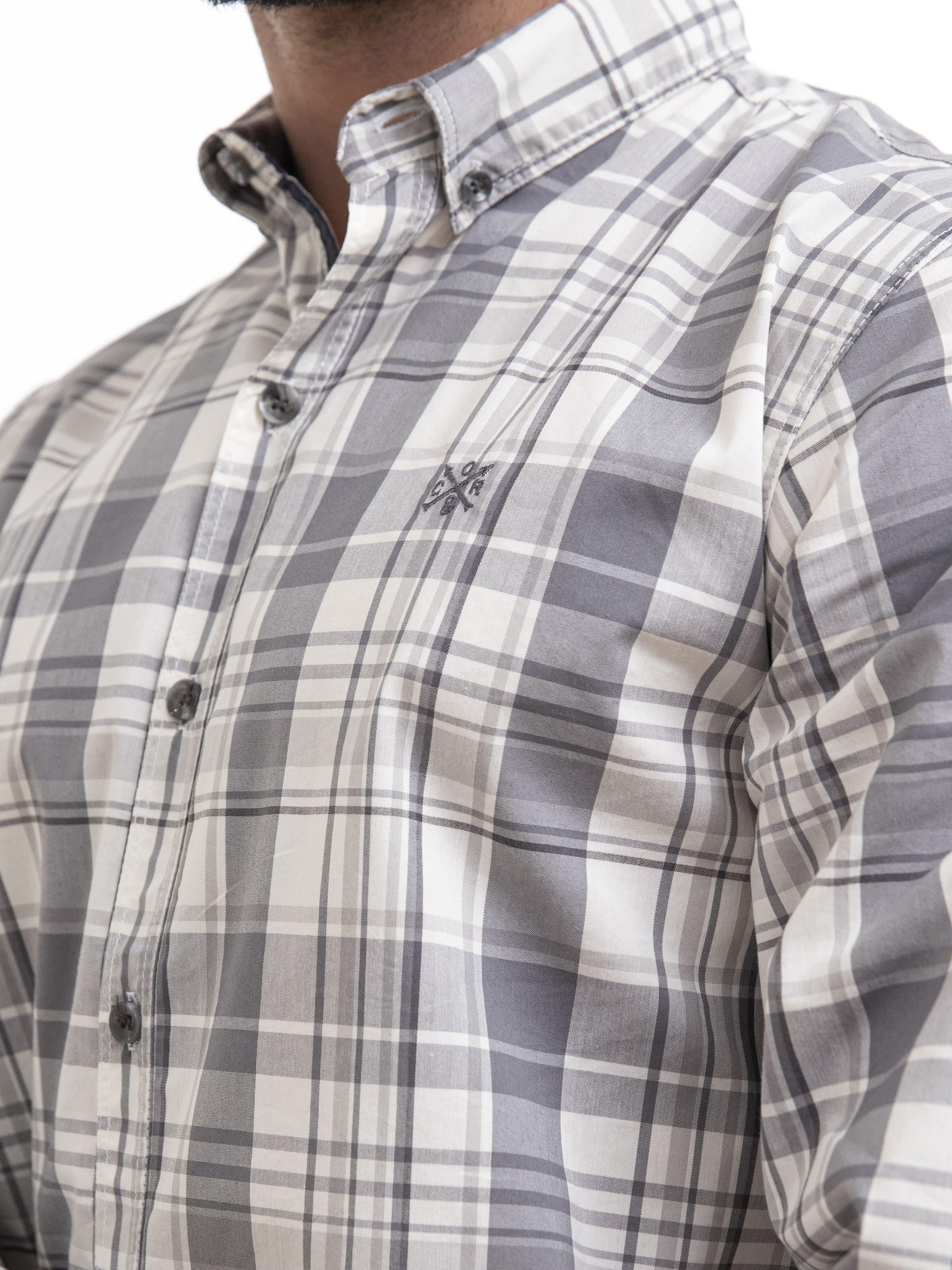 Light grey plaid long-sleeve shirt front with button placket and small chest logo