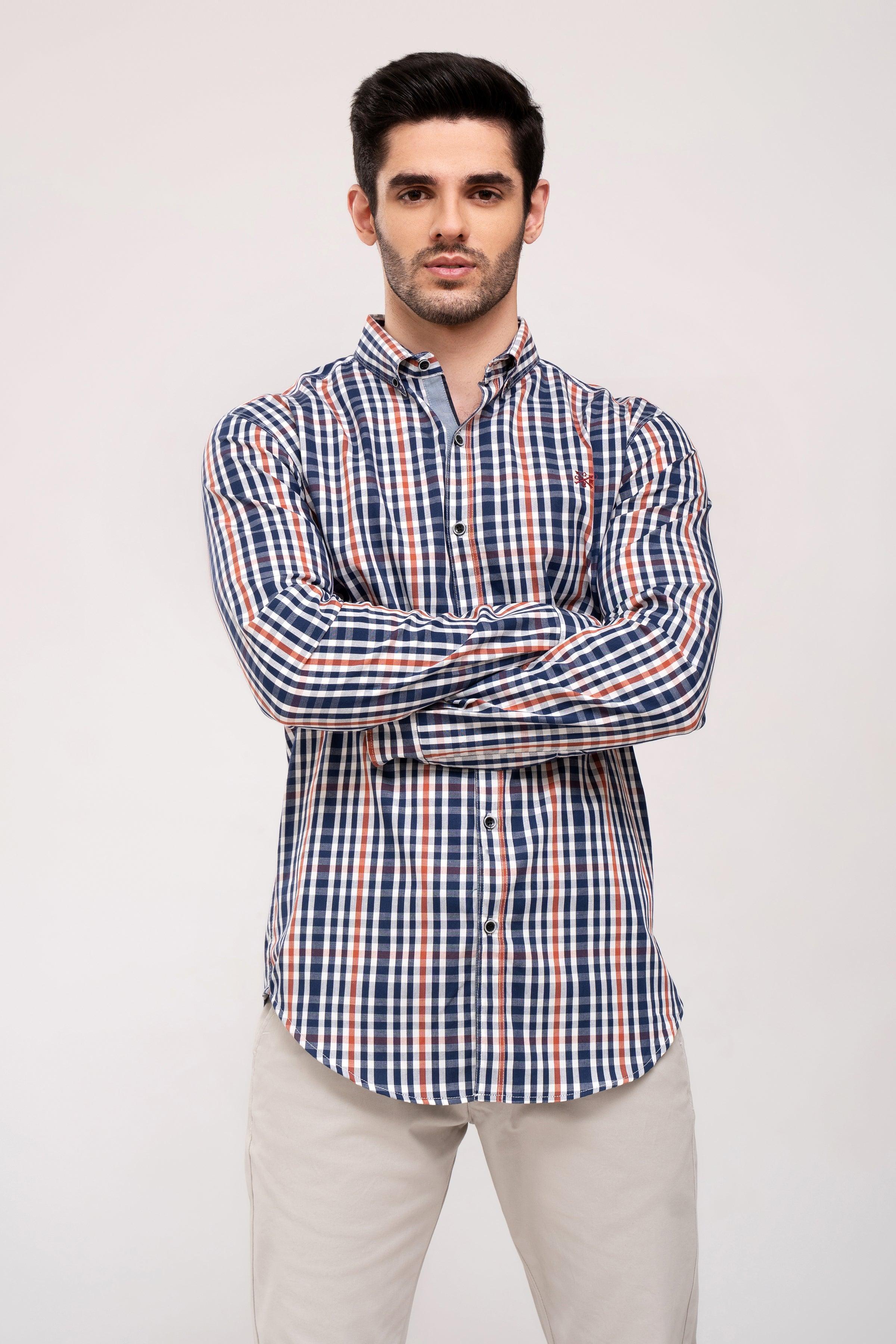 Men's navy and white check long-sleeve button-up casual shirt, arms crossed