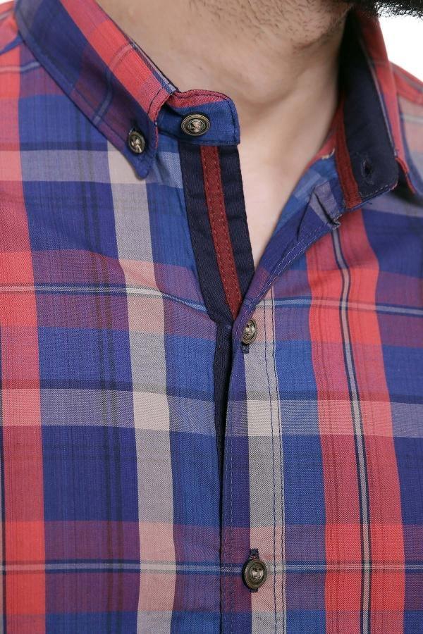 Check shirt collar and button placket in blue, rust, and red plaid