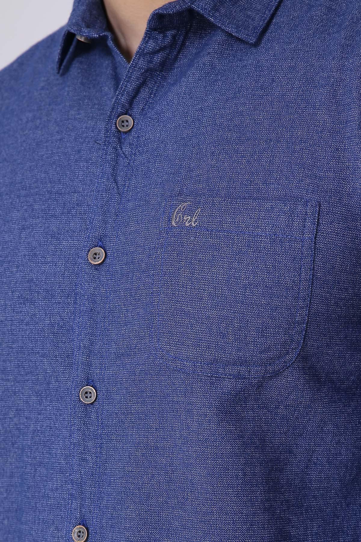 Blue slim-fit long-sleeve casual shirt with 'Orl' chest logo and buttons