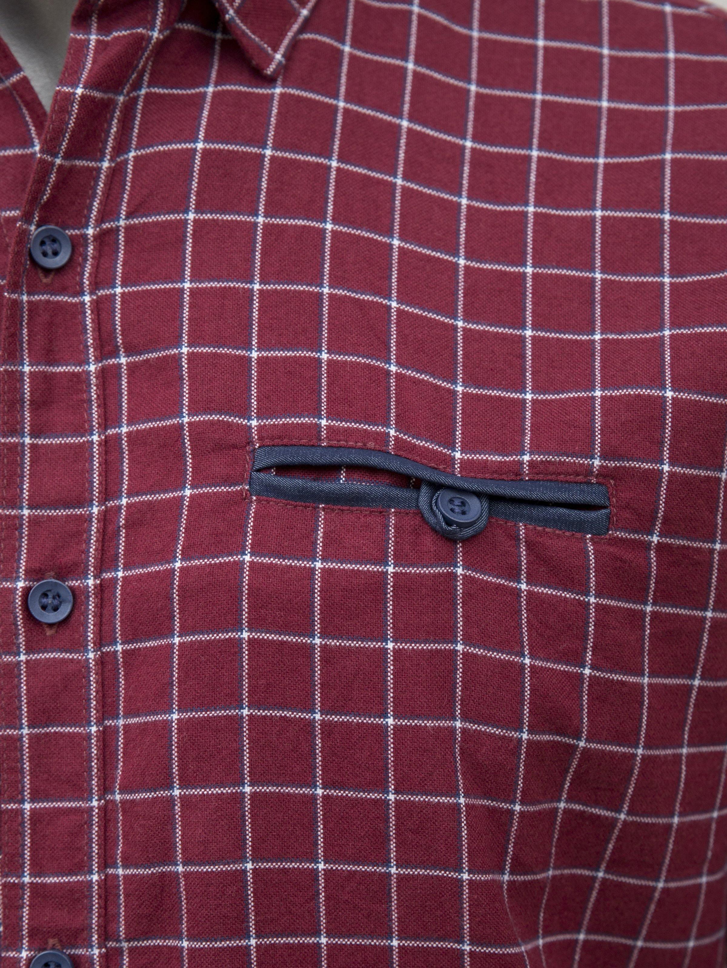 Maroon check shirt front with chest pocket flap and button details