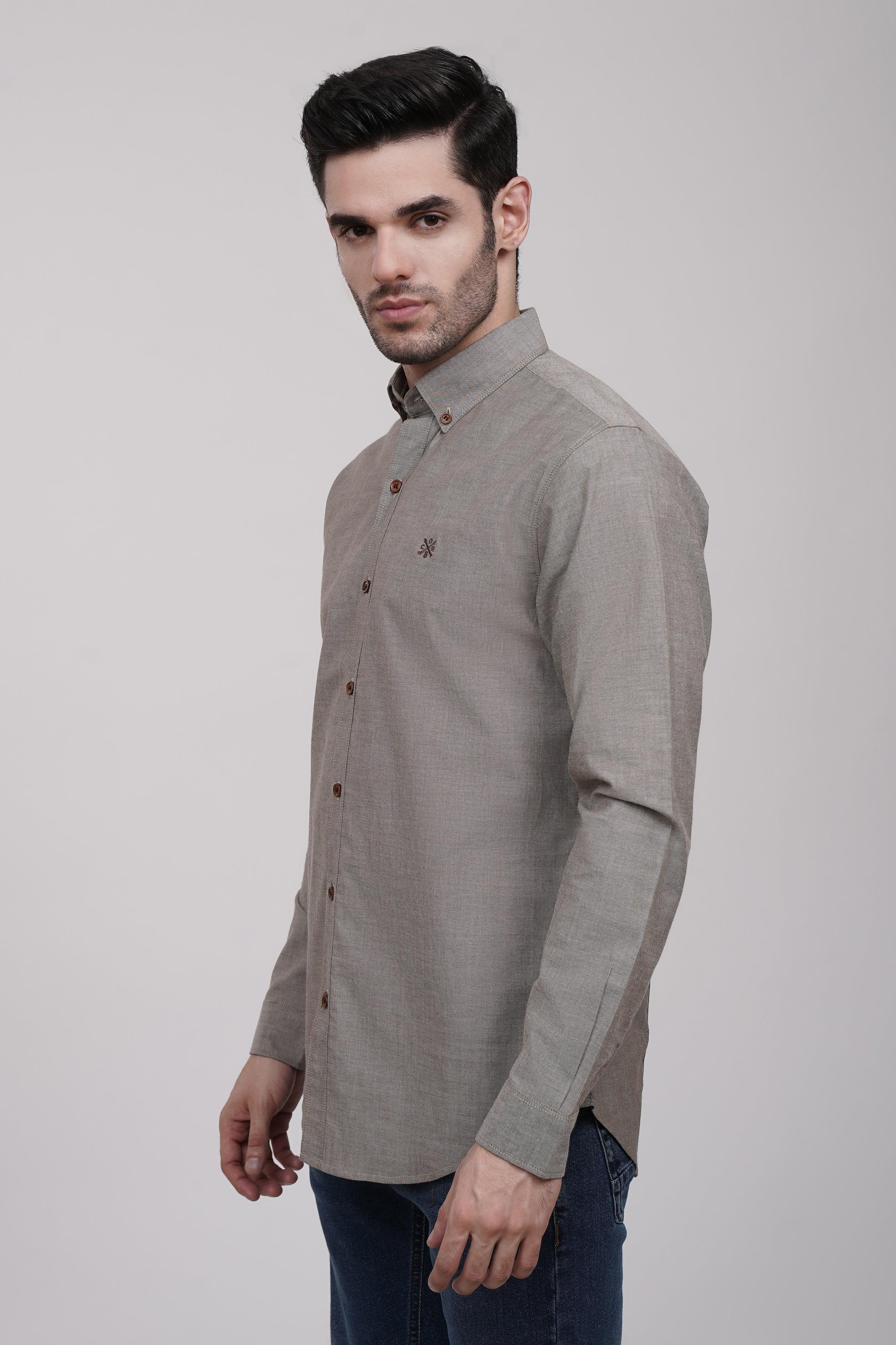 Khaki button-up shirt with stand collar and long sleeves, side view