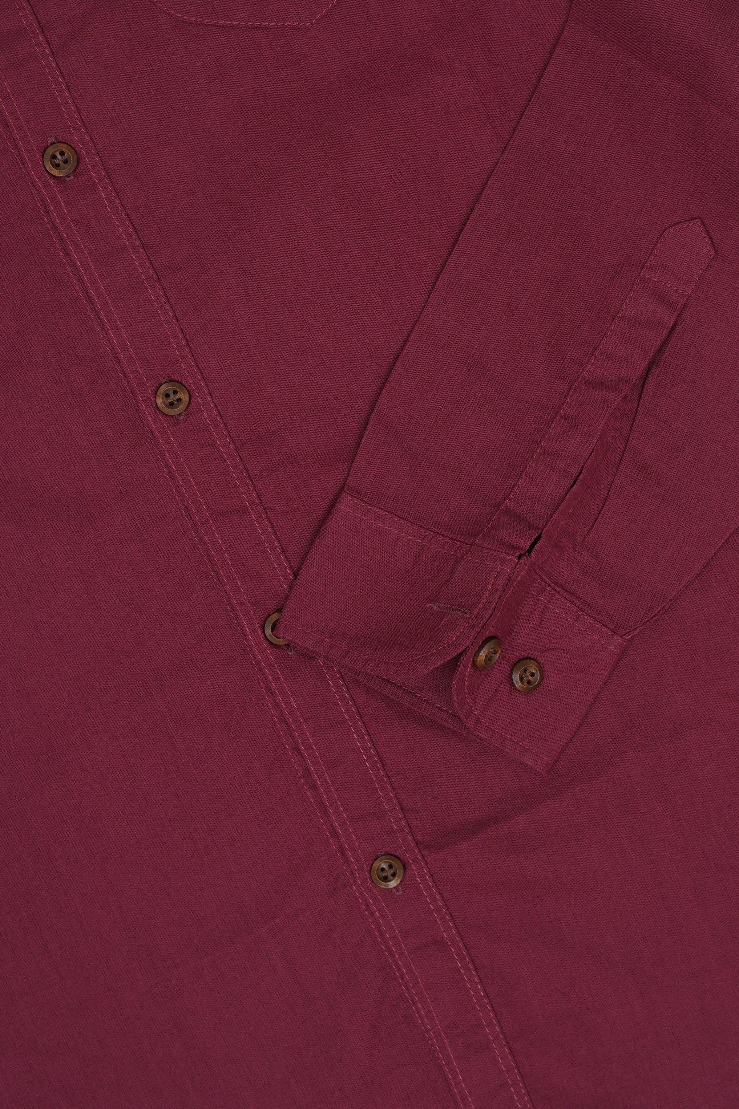 Maroon casual shirt close-up of button placket and stitched seams