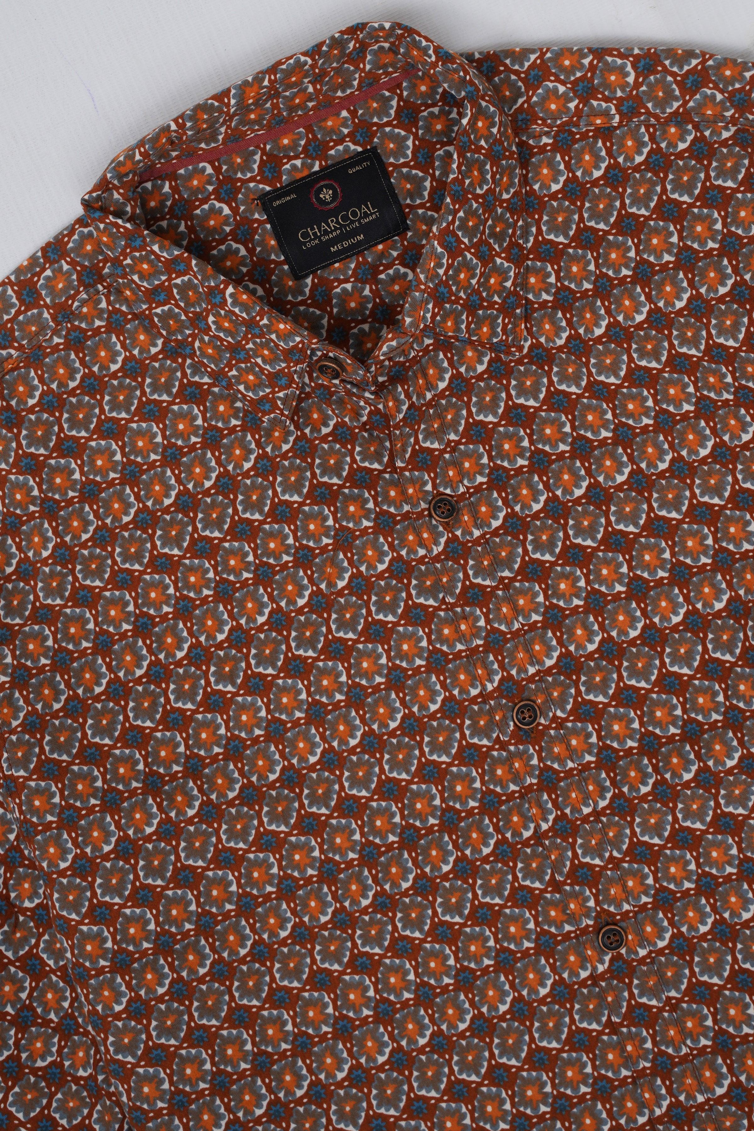 Casual shirt close-up: spread collar and button front with multicolor geometric print