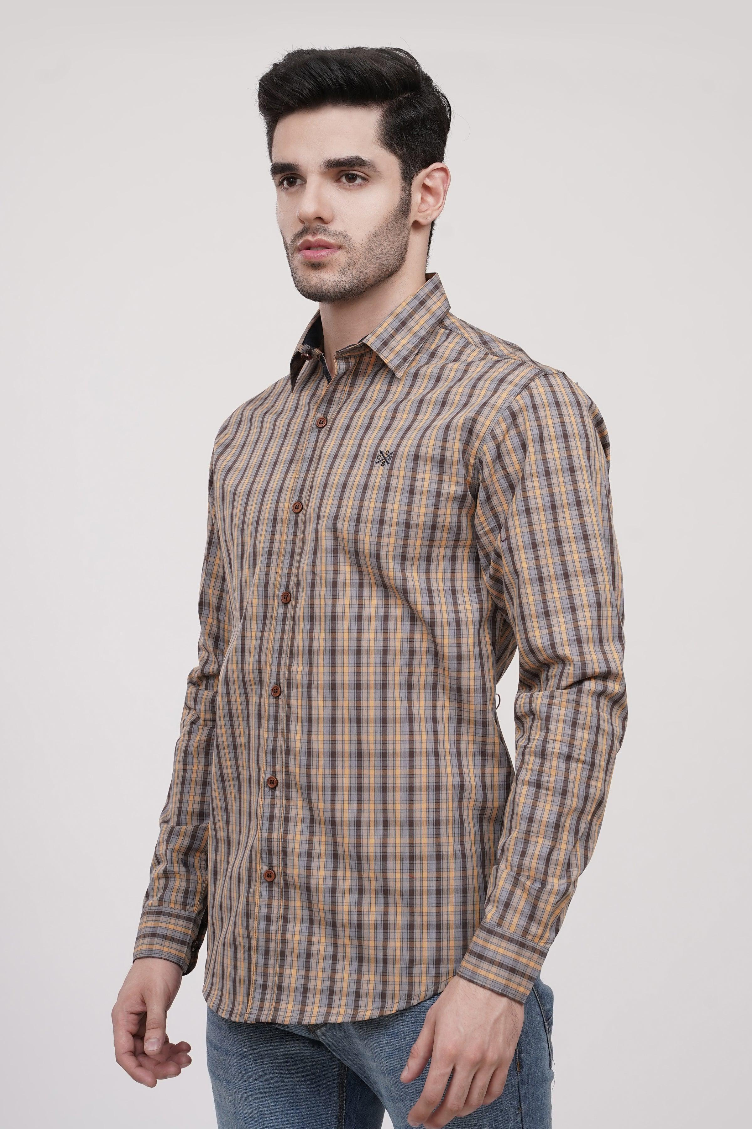 Plaid button-up casual shirt with long sleeves, brown and blue check pattern.