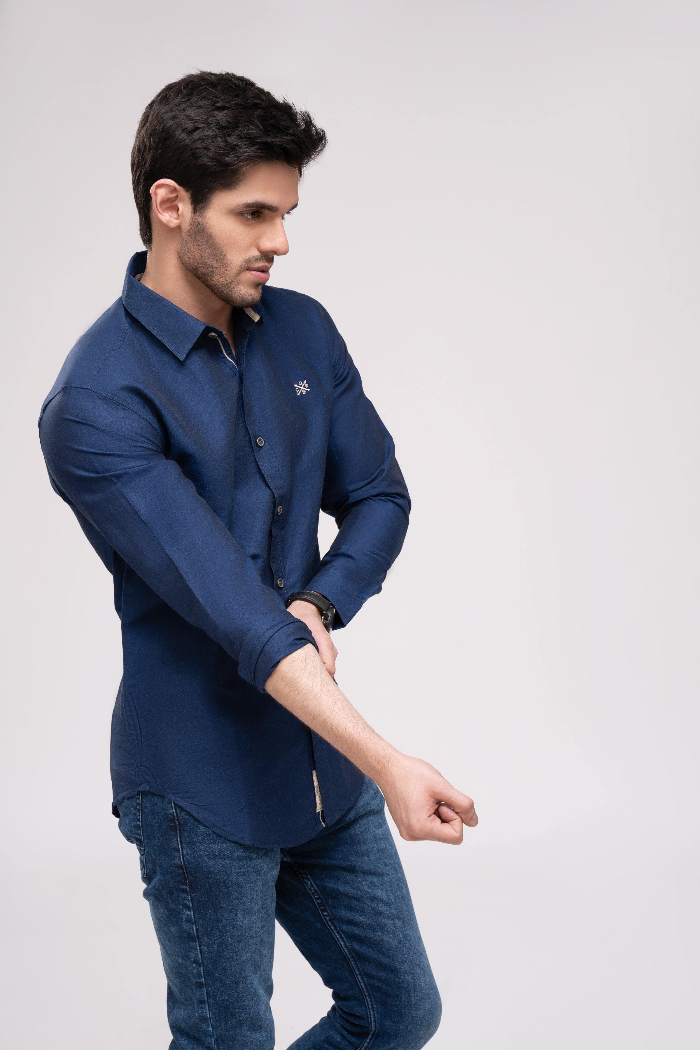 Navy casual button-up shirt with long sleeves, pointed collar, and small chest emblem