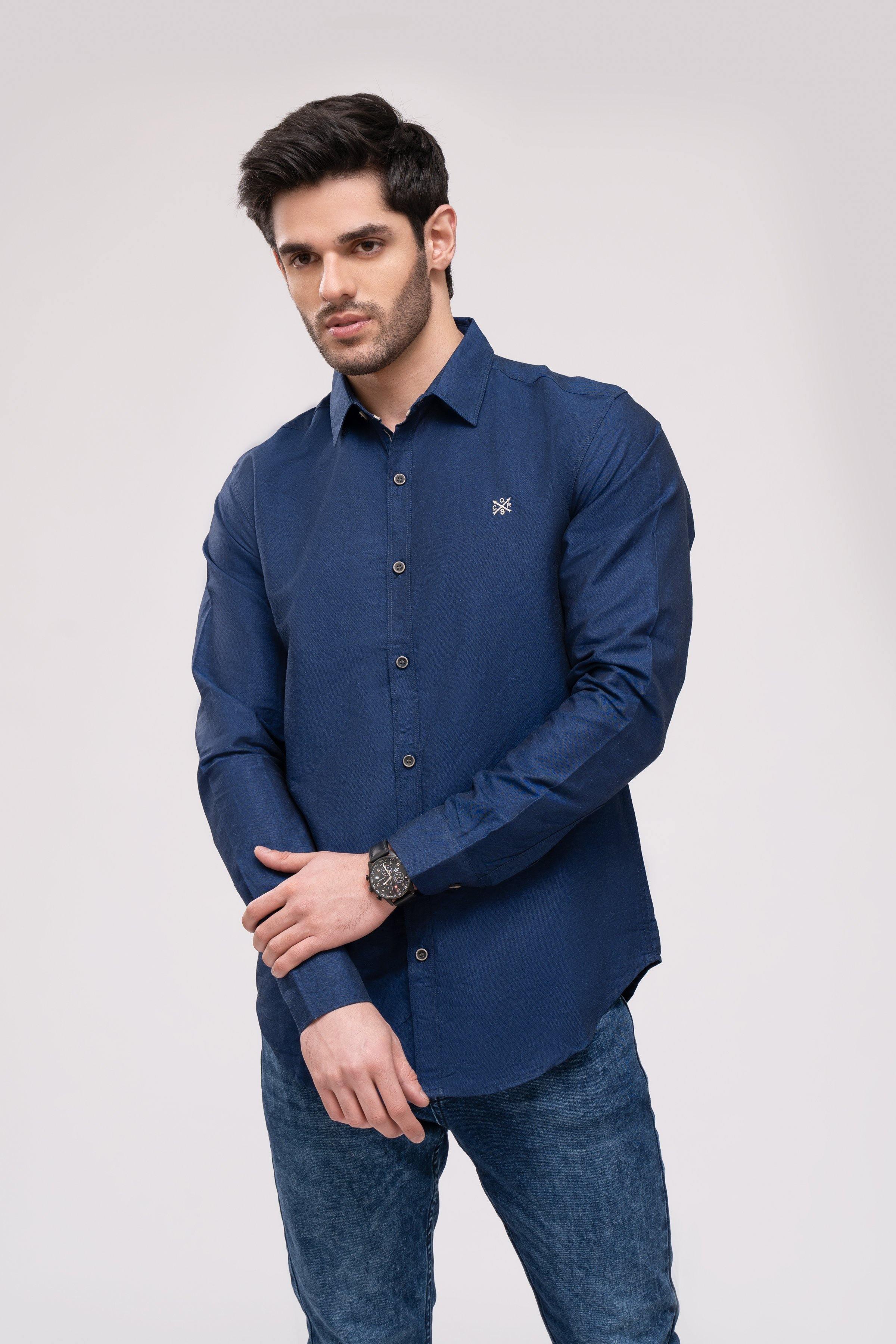 Navy casual button-up shirt with long sleeves, button placket, and small chest emblem