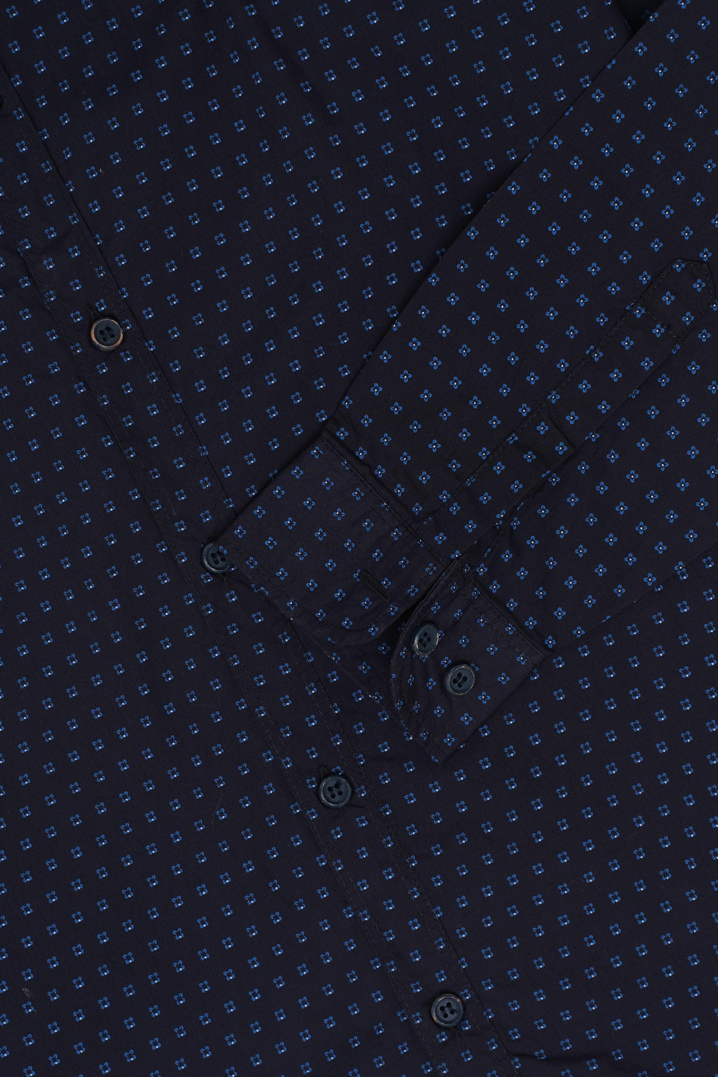 Navy button-up shirt close-up with small allover pattern and round buttons