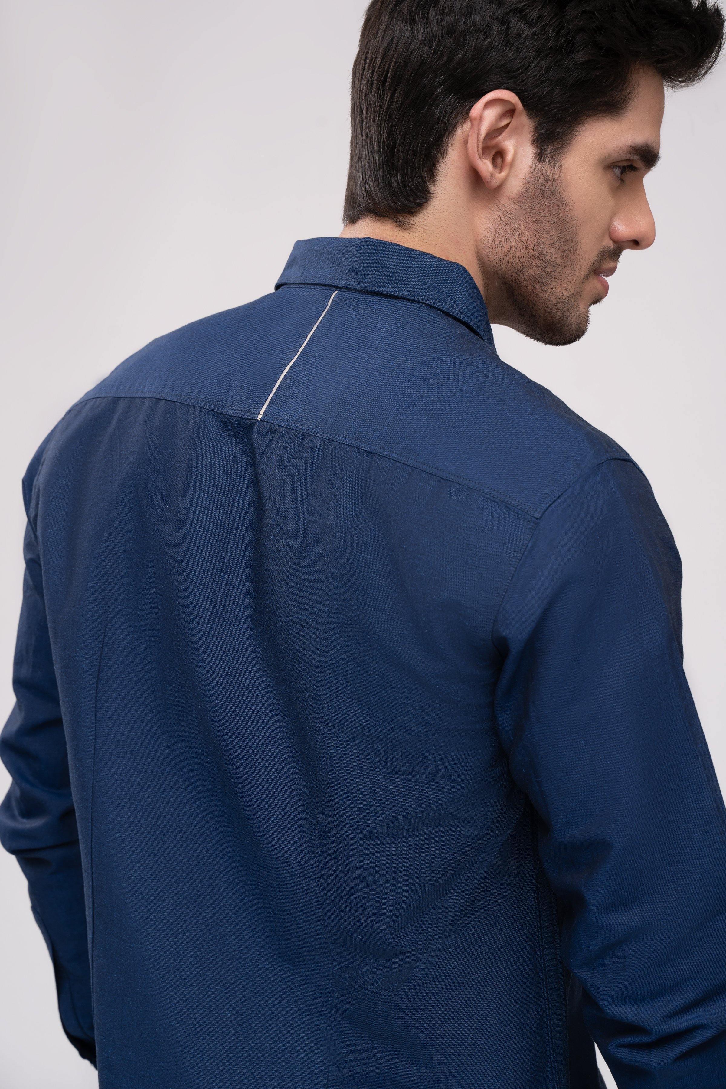 Back of navy casual button-up shirt with long sleeves and yoke seams