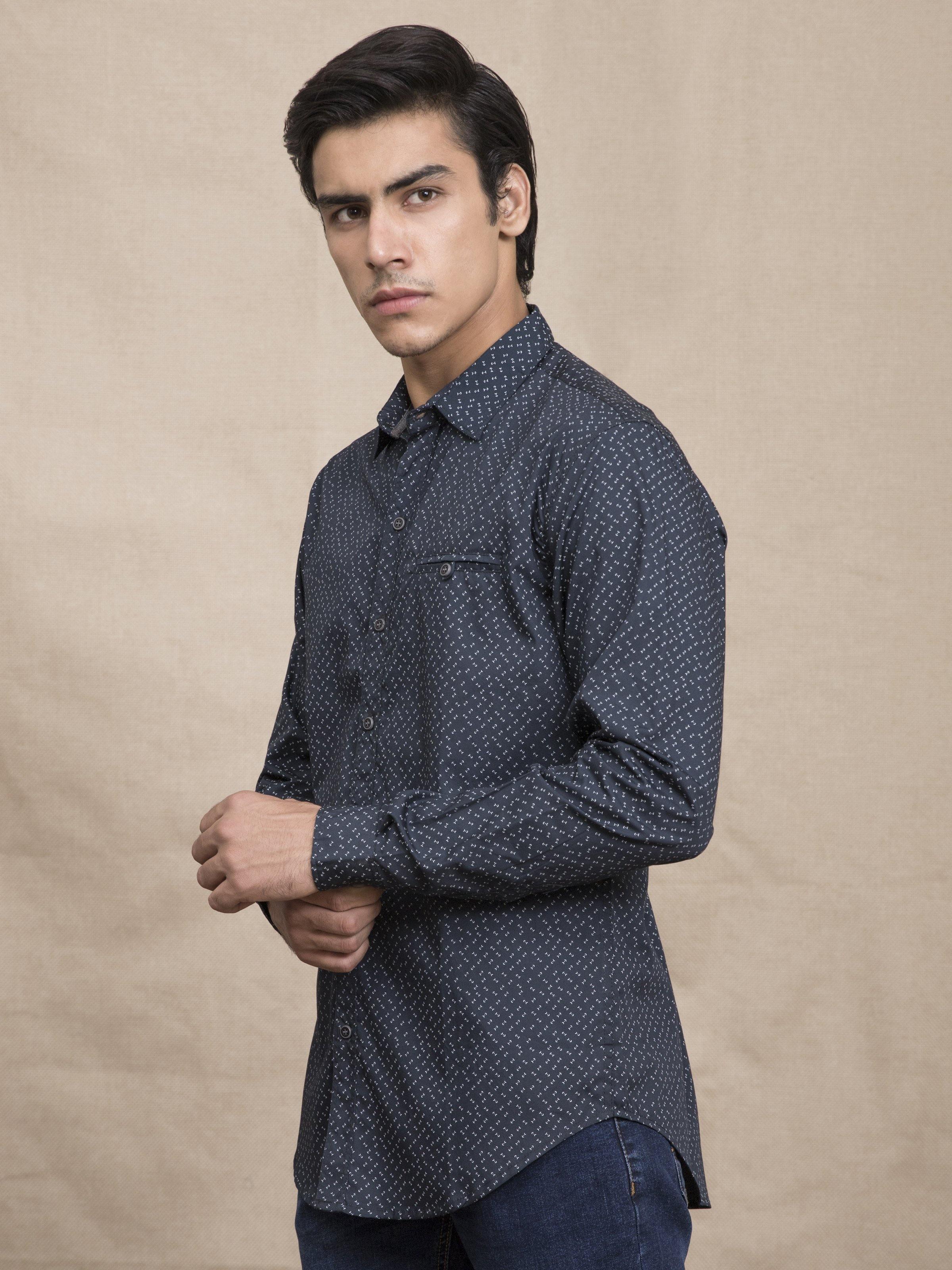 Navy patterned casual button-up shirt with long sleeves, side view