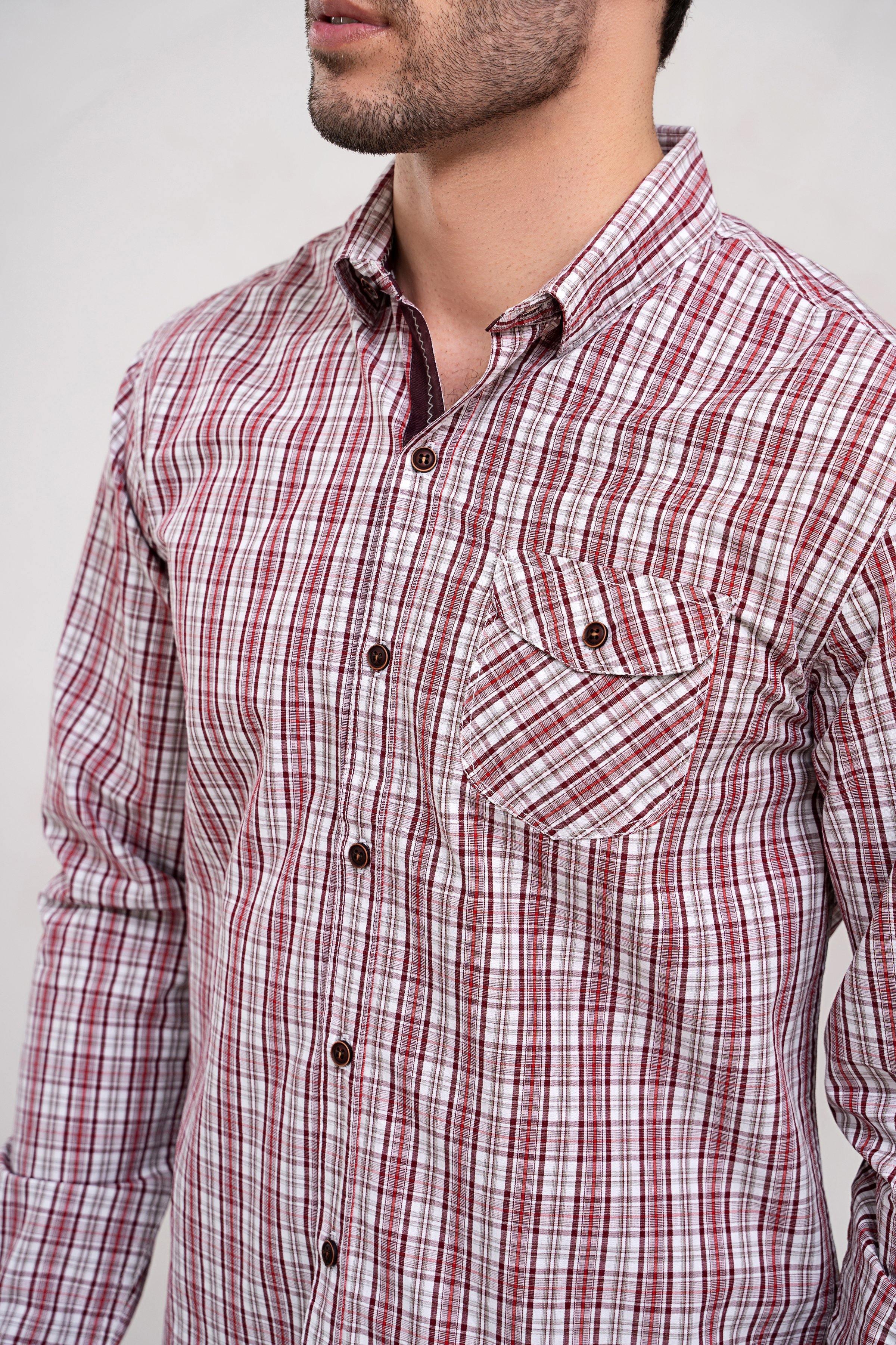 Maroon and off-white plaid button-up casual shirt close-up with chest pocket