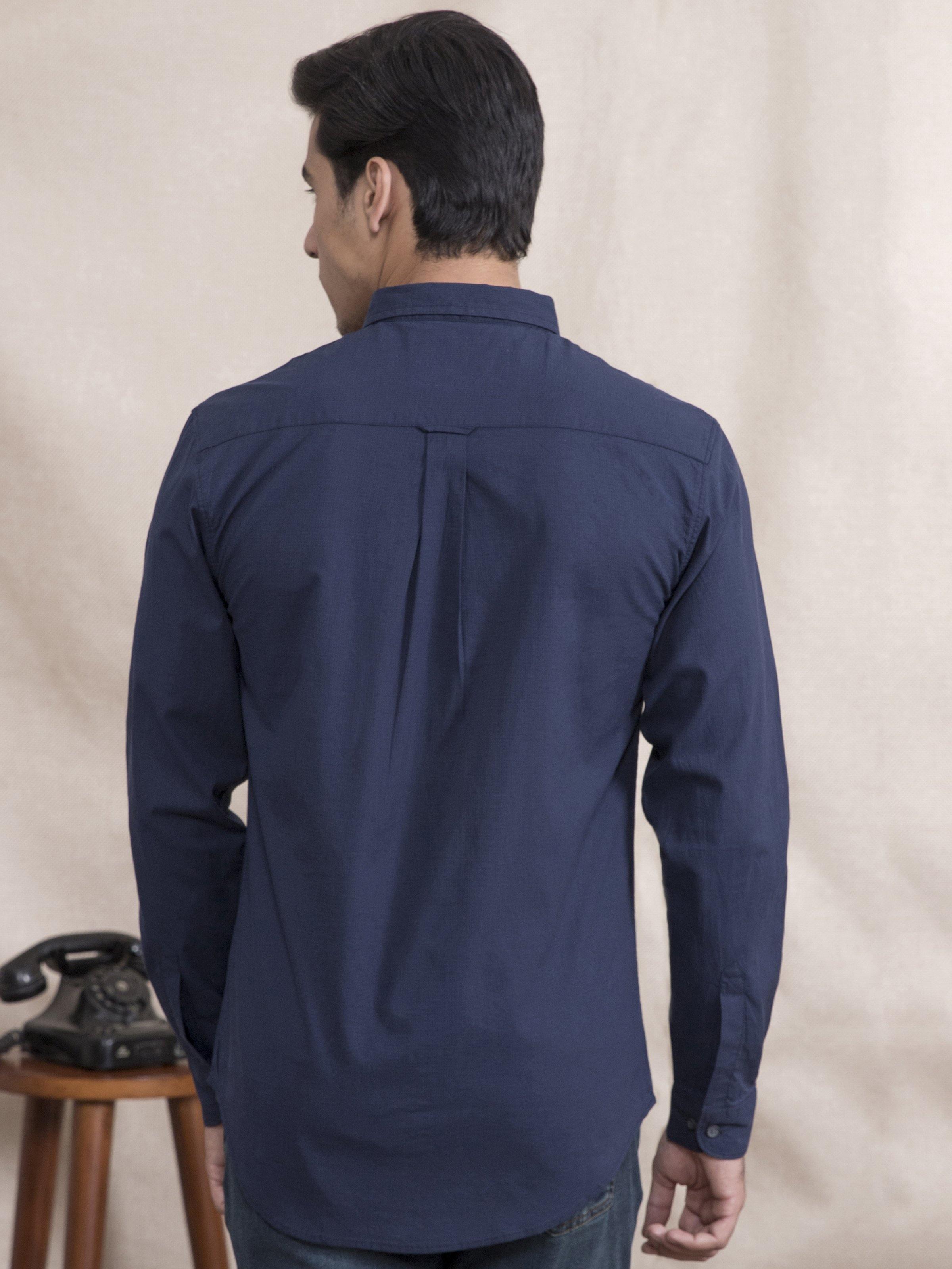 Navy slim-fit button-up shirt, back view with center yoke seam