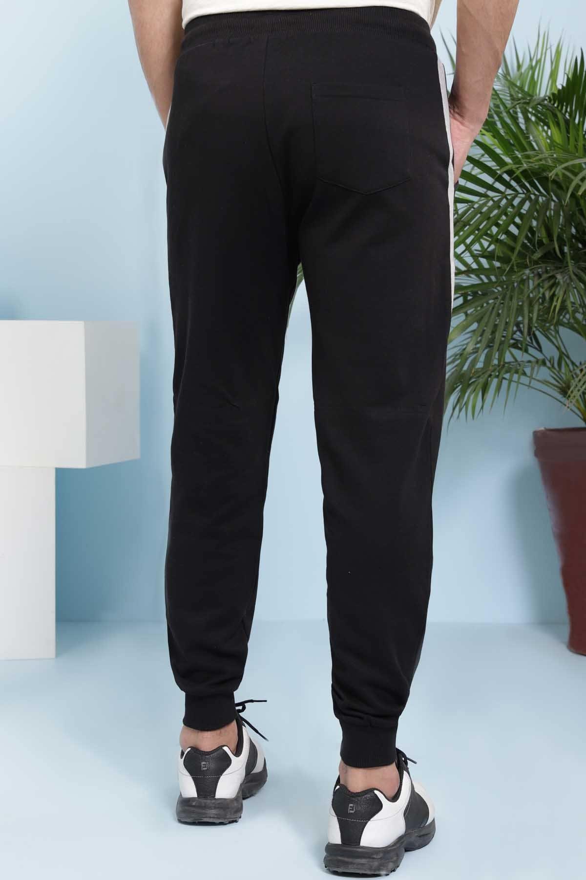 Black casual jogger trousers with tapered legs, ankle cuffs, and drawstring waist