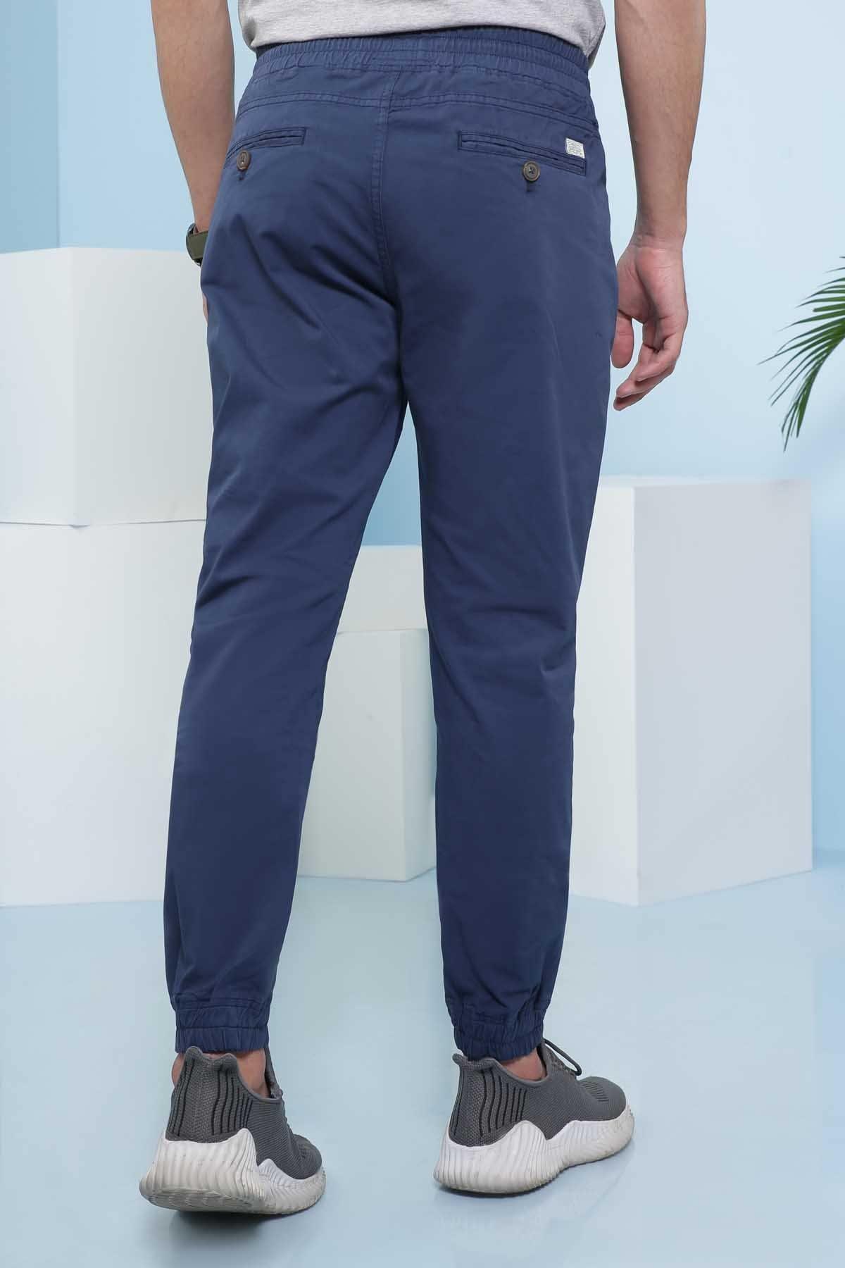 Men's blue casual trousers with side pockets and elastic cuff hems