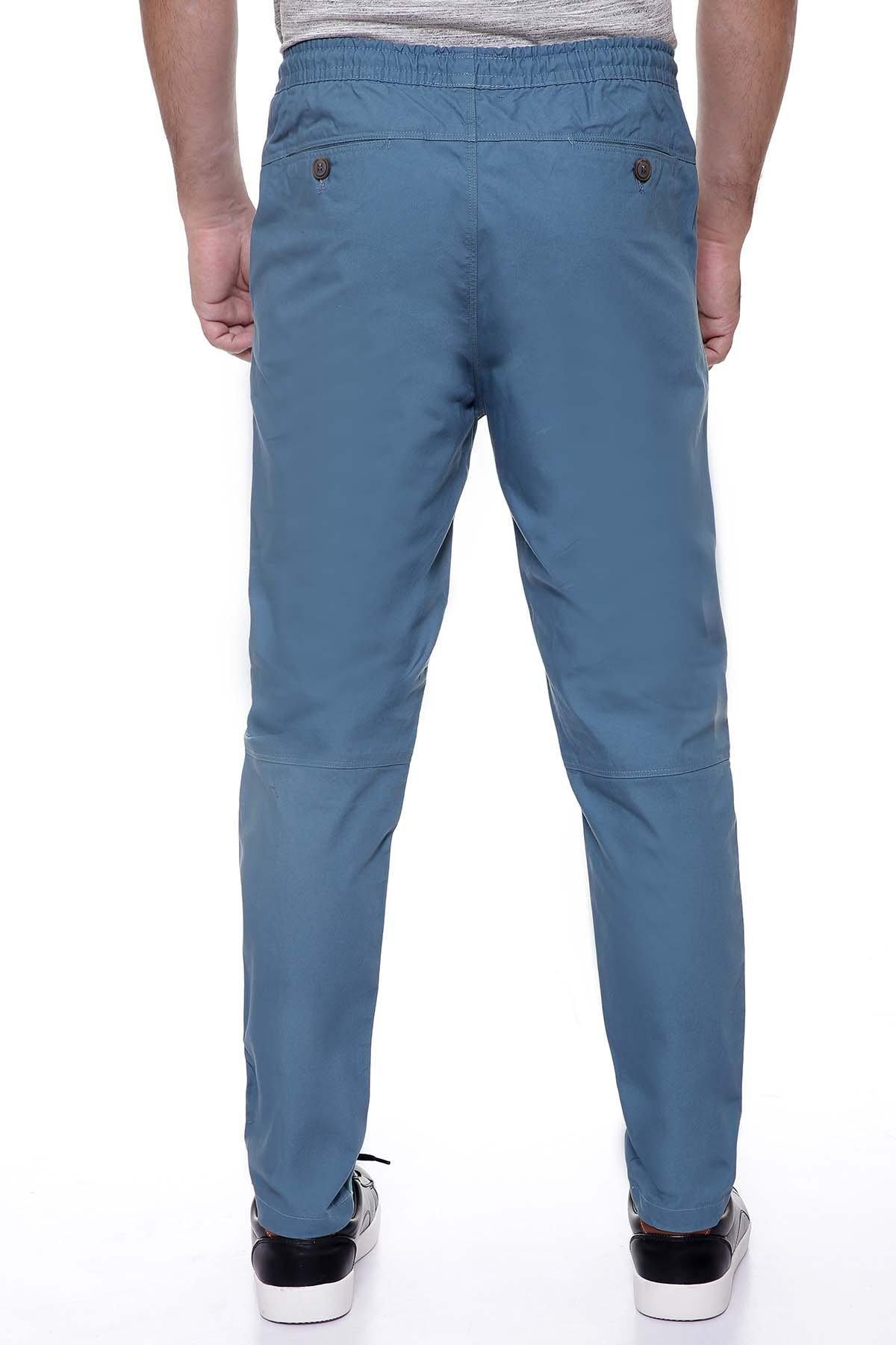 Blue casual trouser pants with back yoke seams and side pockets
