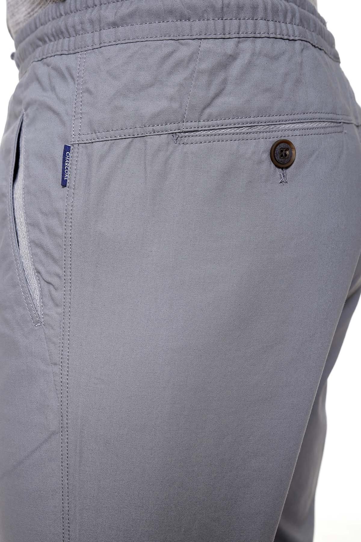 Grey casual trouser back pocket with button detail and stitched seams