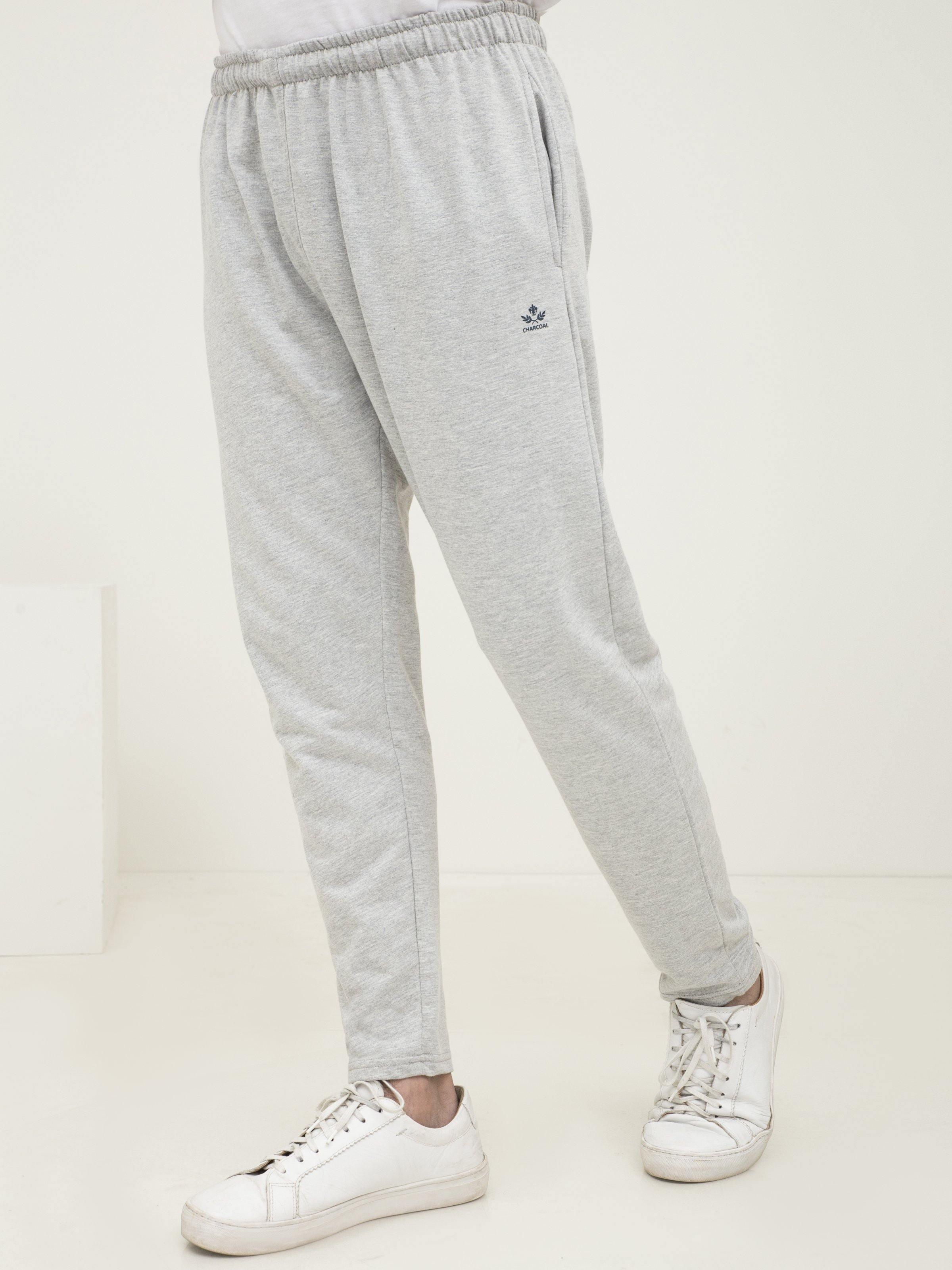 Grey melange knit sleep trousers with elastic waistband and tapered ankle cuffs