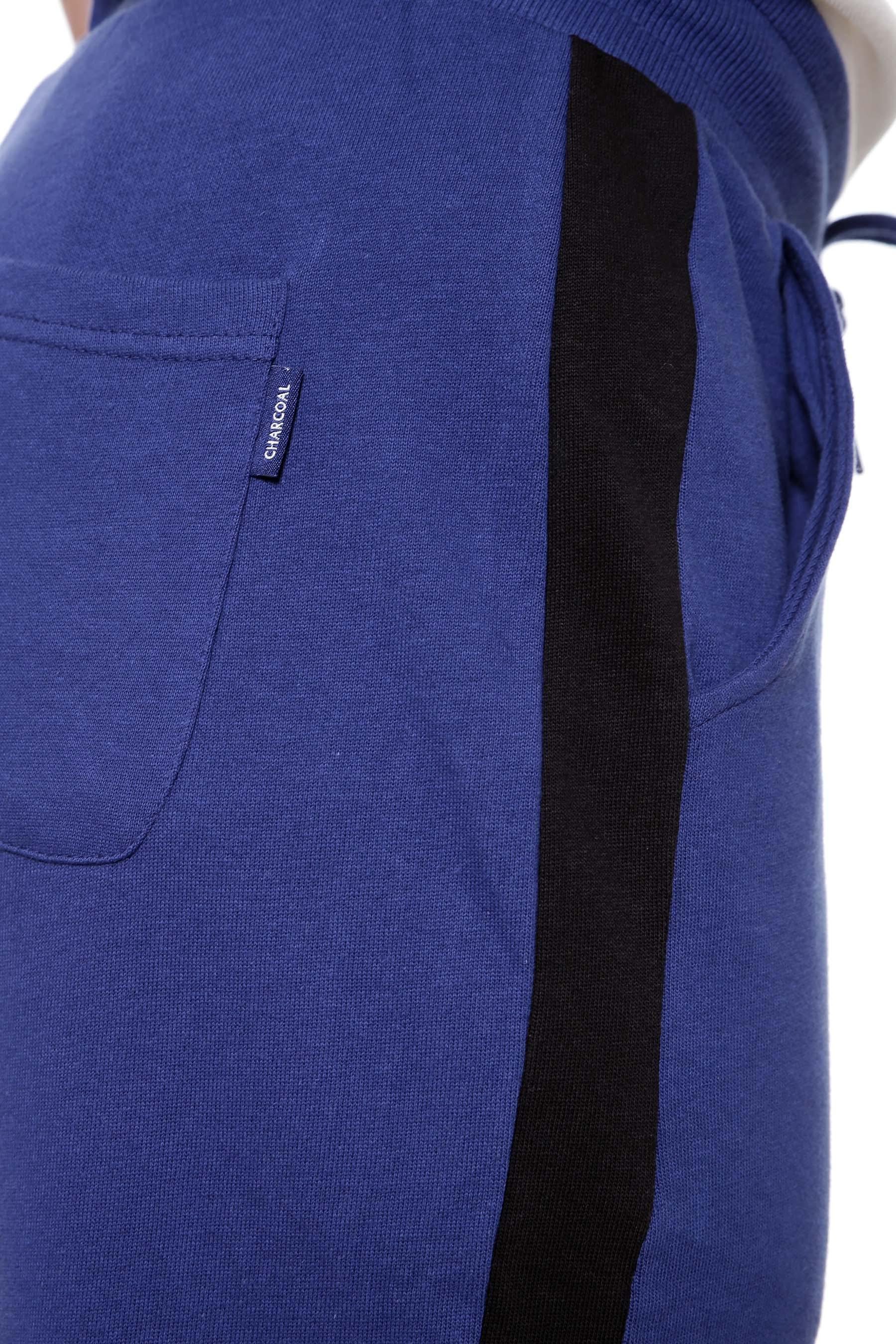 Navy casual trouser with side pocket detail, drawstring waist, and black stripe