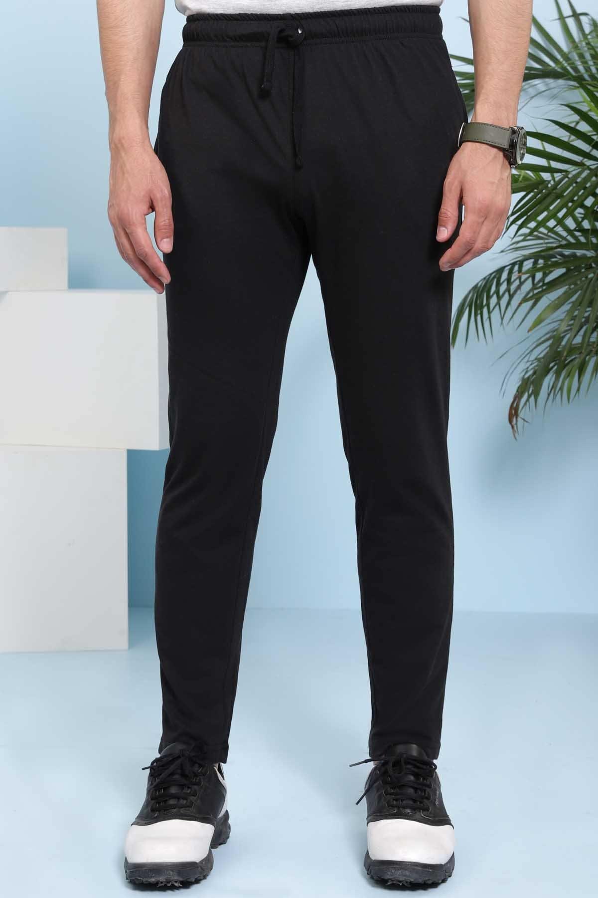 Black casual sleep trousers with elastic waistband, drawstring, and side pockets.