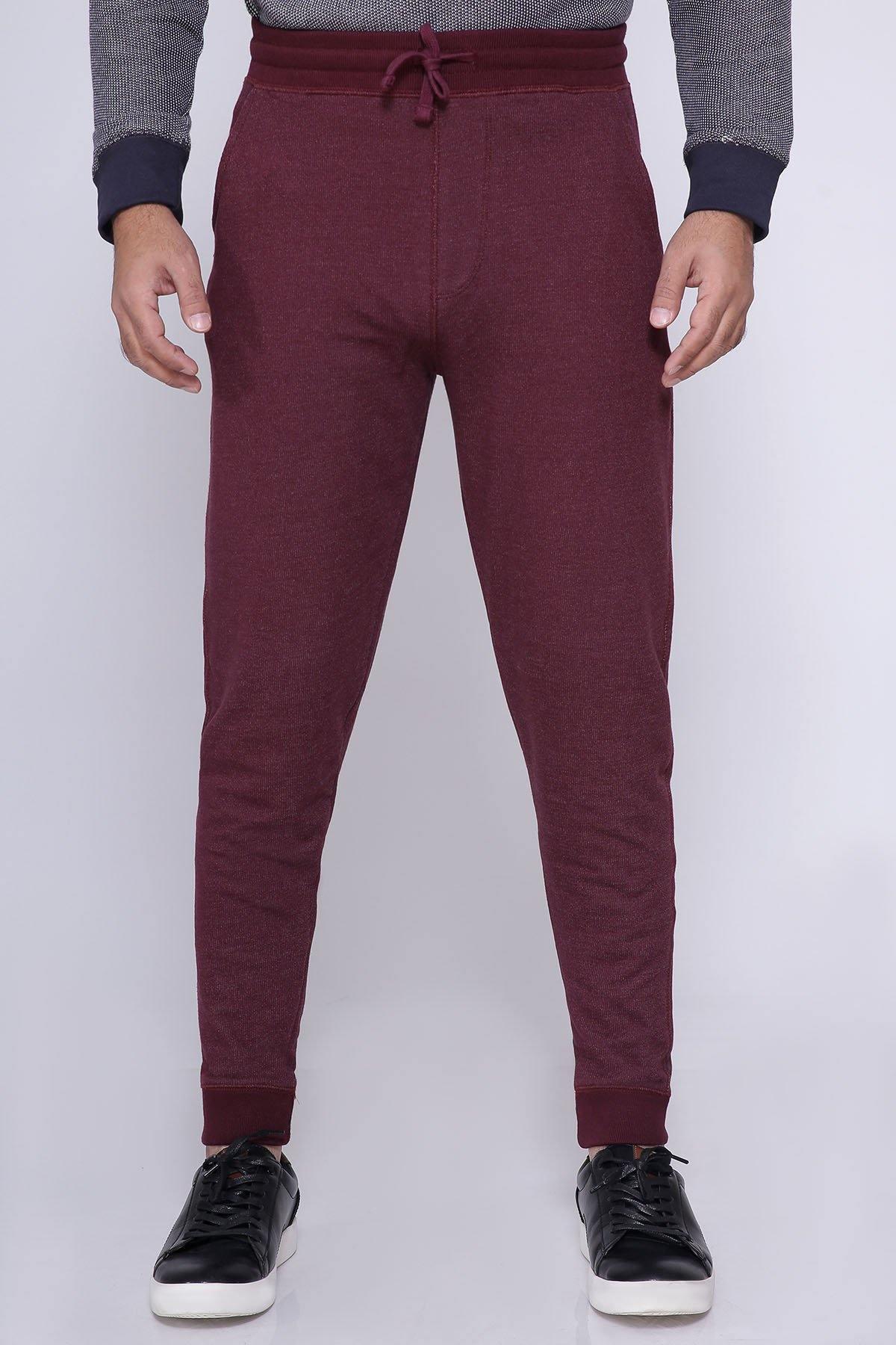 Maroon chain yarn trousers with drawstring waist and slim tapered legs