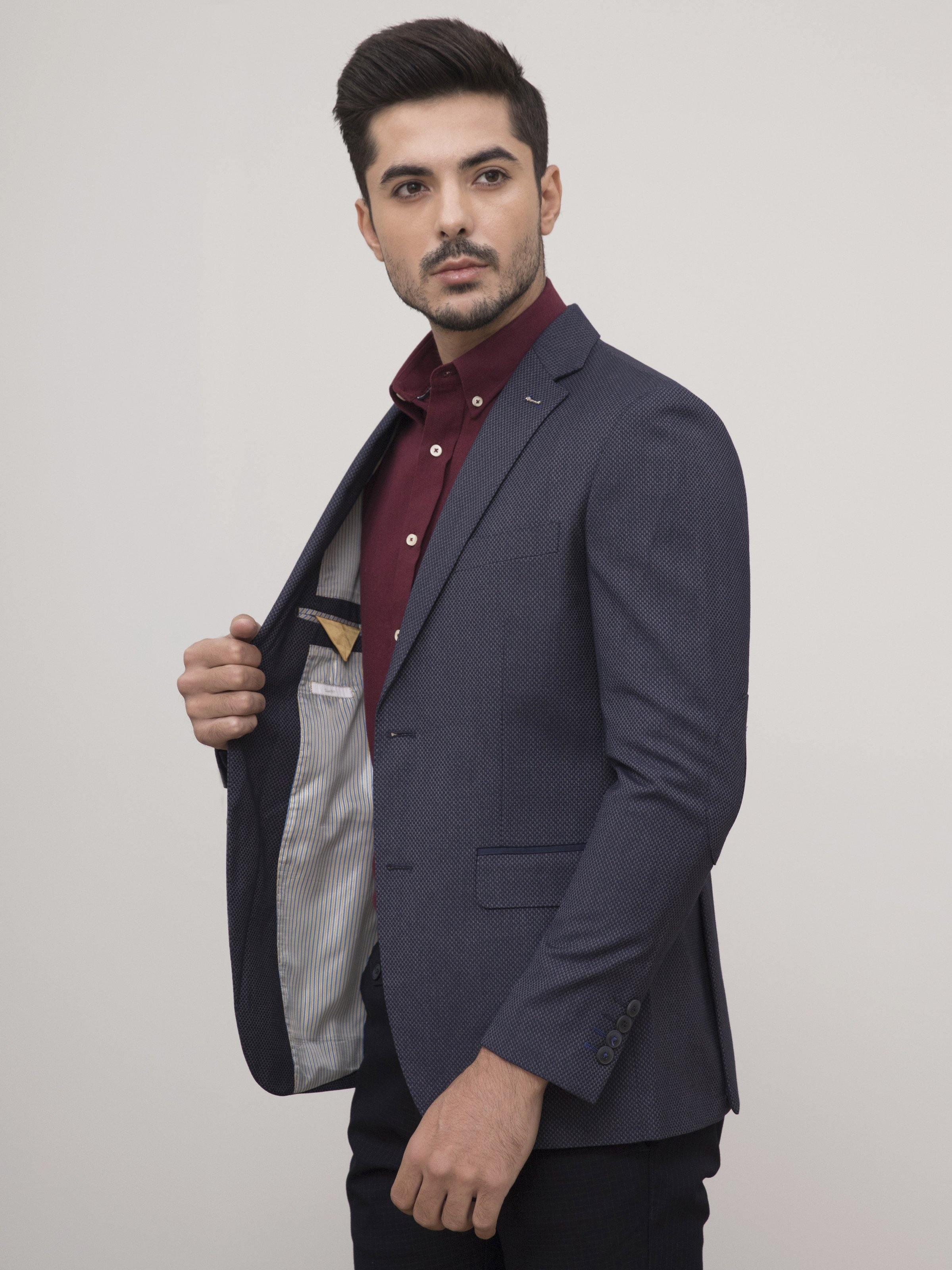 Slim-fit two-button coat in dark navy, open front showing light lining and pockets