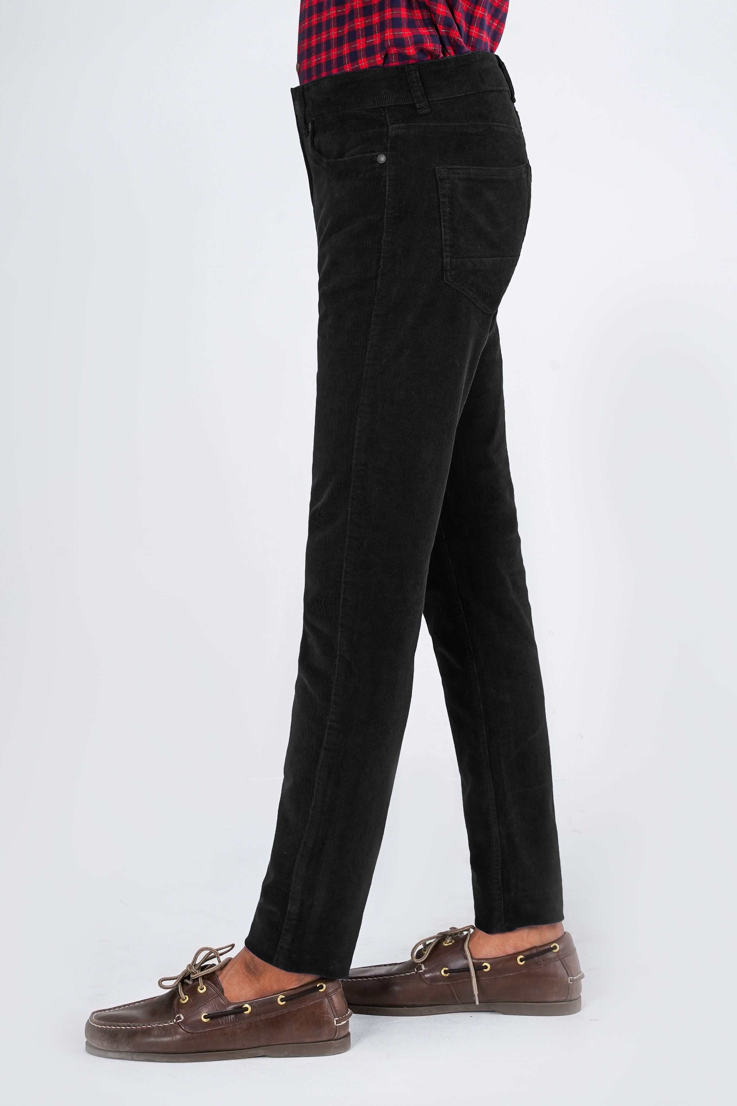 Black corduroy 5-pocket pant, side view with straight leg and belt loops