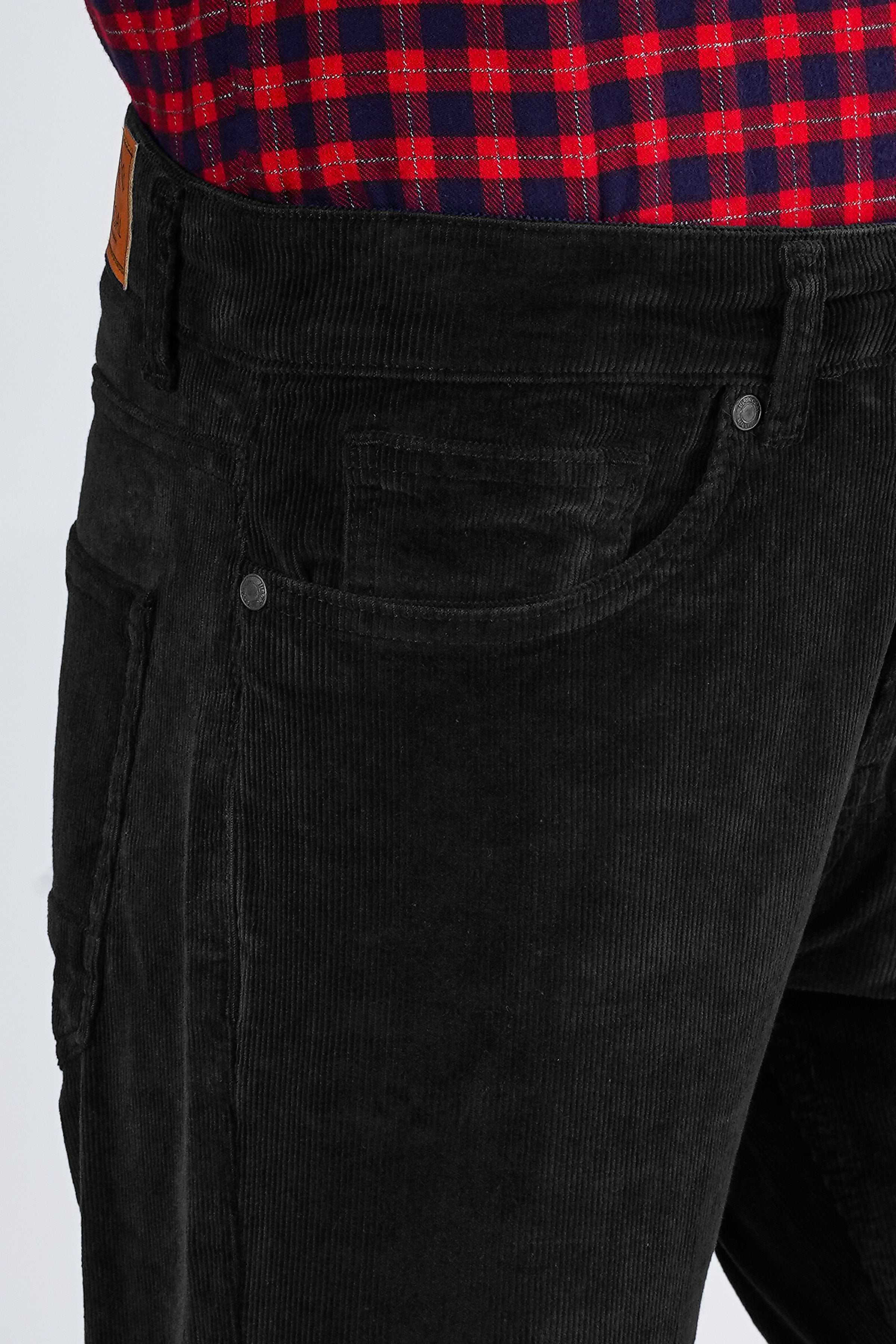 Black corduroy jeans-style pocket with button and seam detail