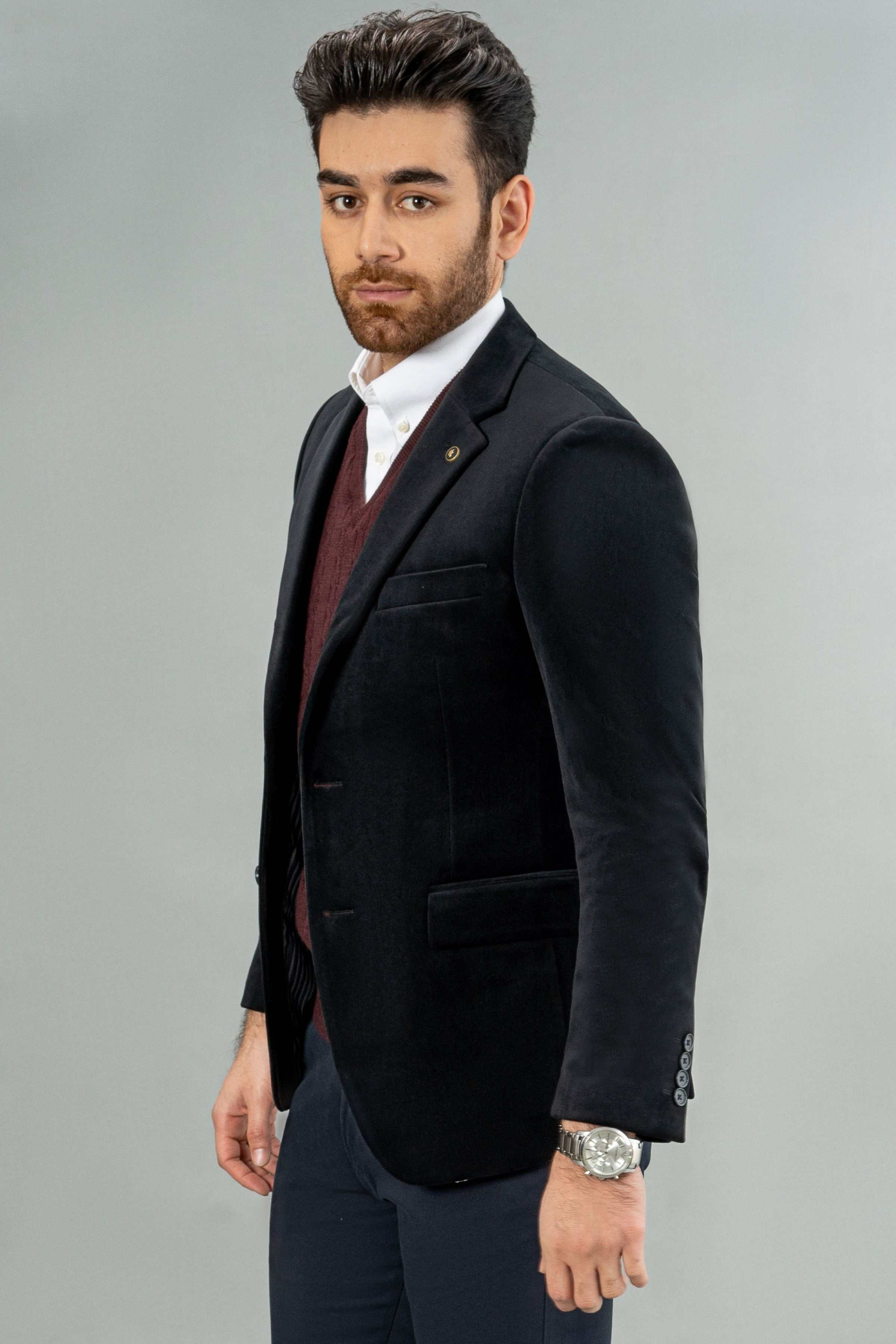 Black corduroy casual coat side view with flap pocket and cuff buttons