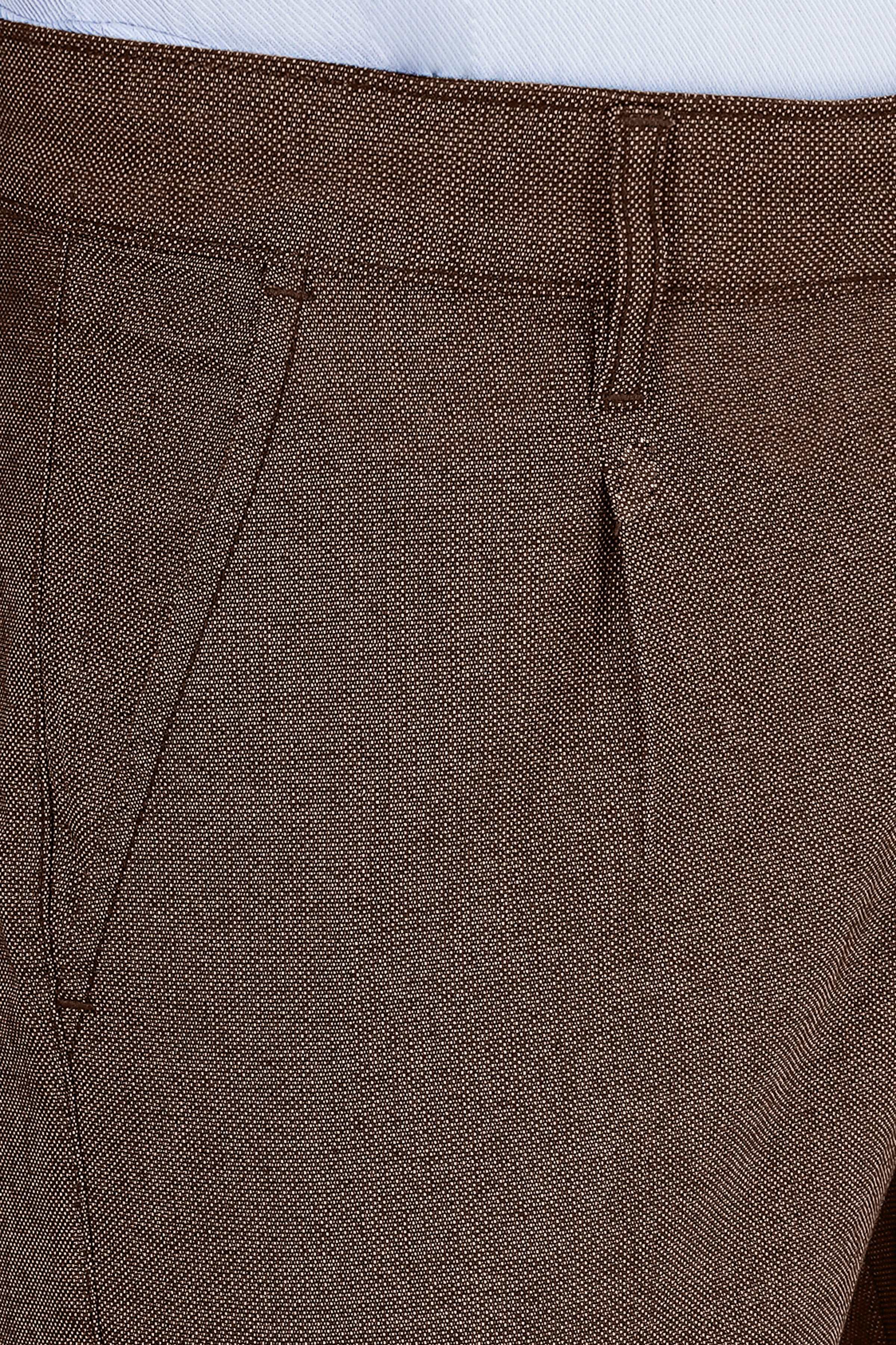 Textured camel-brown pants with cross pocket detailing and belt loops