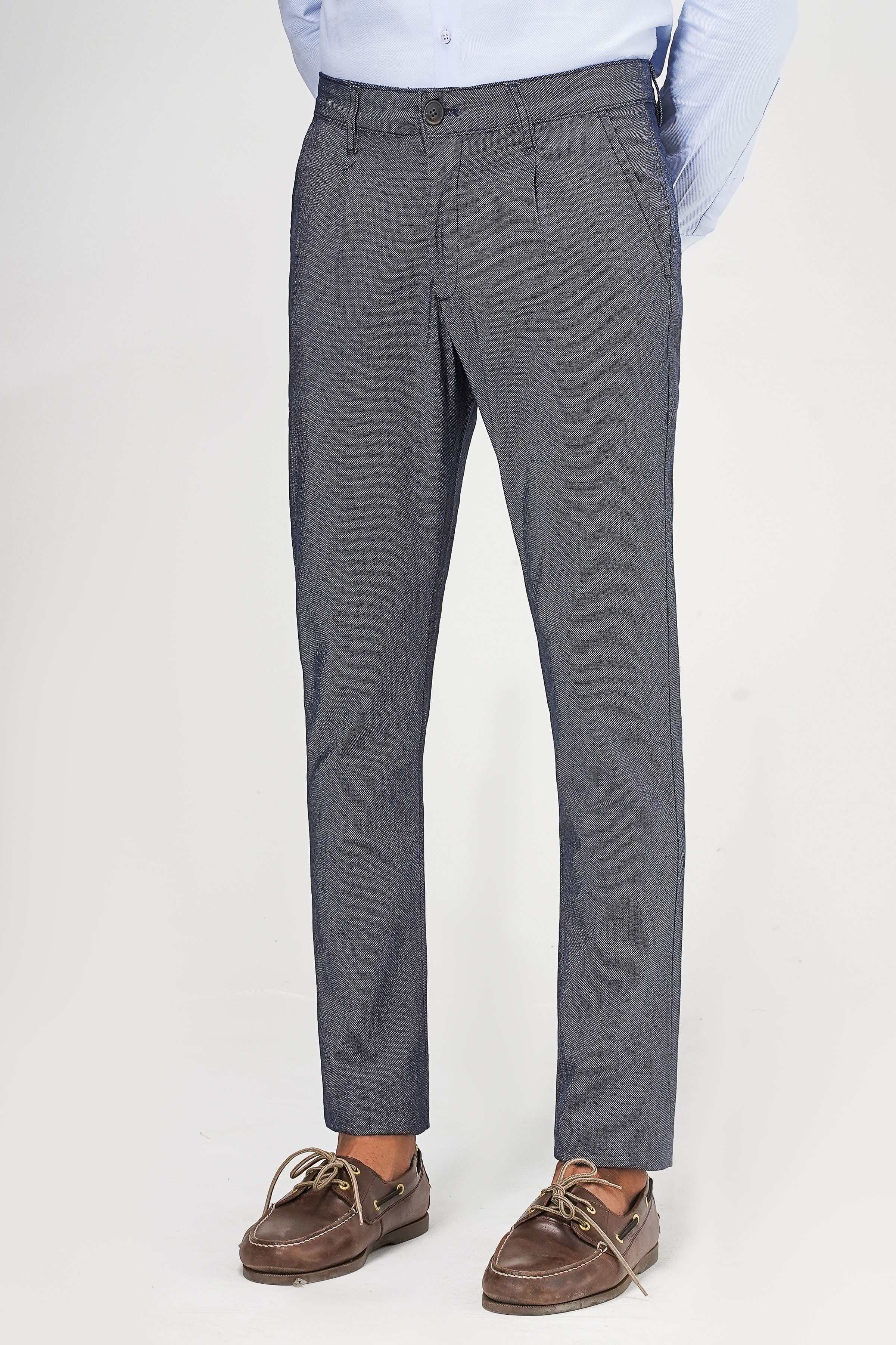 Navy textured dress pants with pleated front and tapered legs
