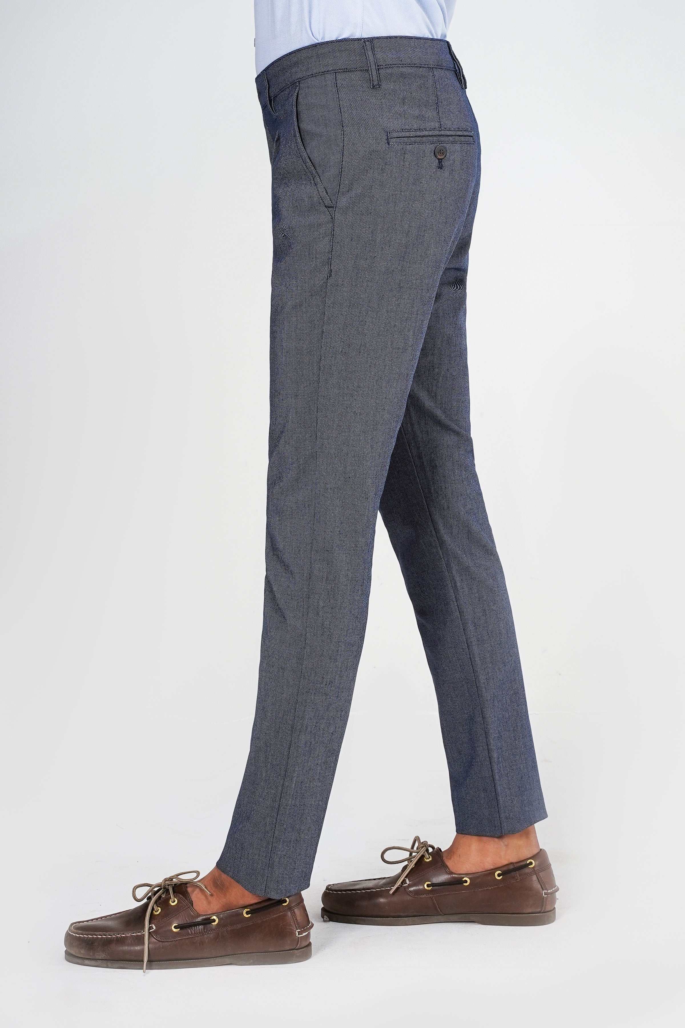 Navy textured dress pants with straight leg, side pockets, and belt loops
