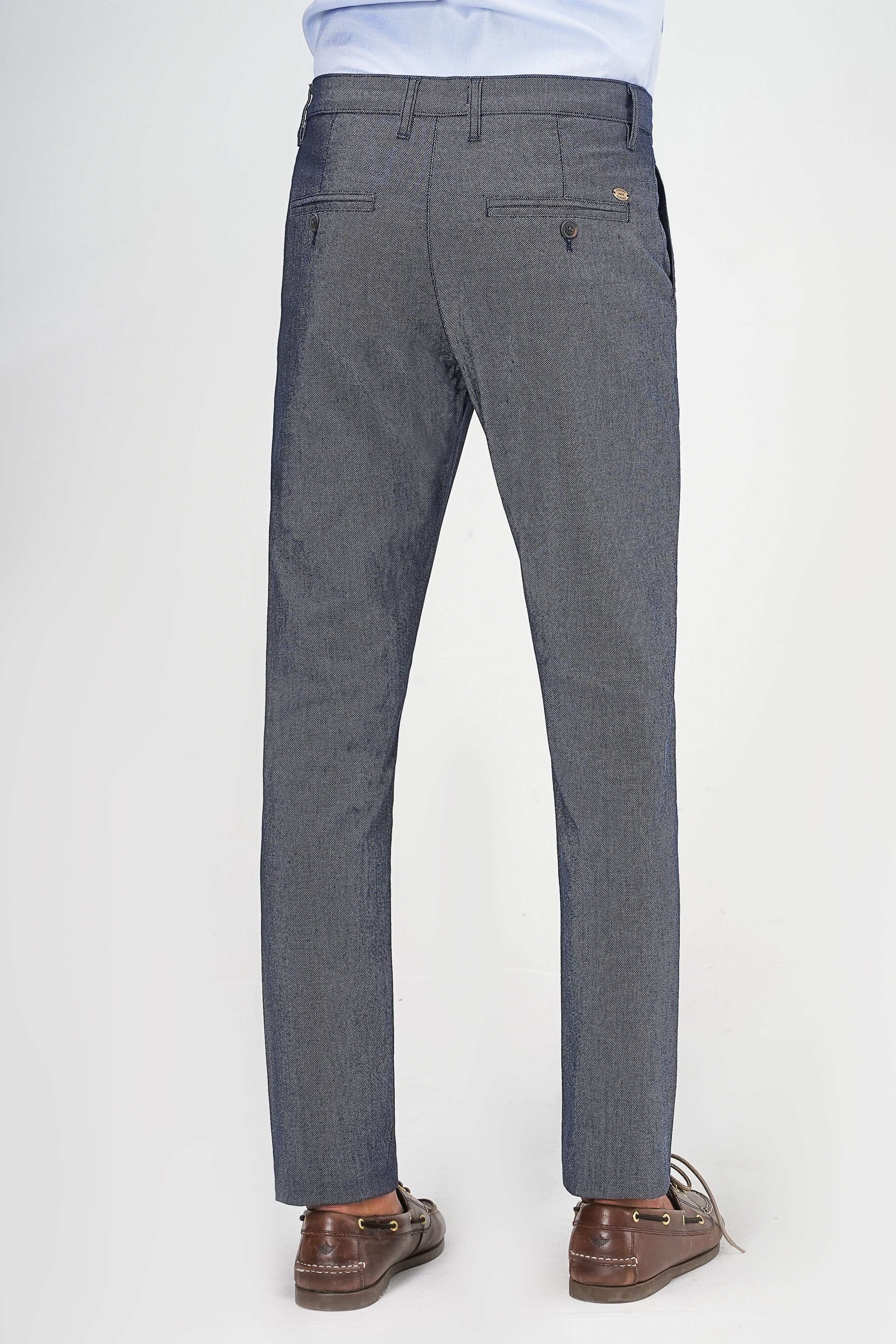 Navy textured dress pants with belt loops, front pleats, and tapered fit